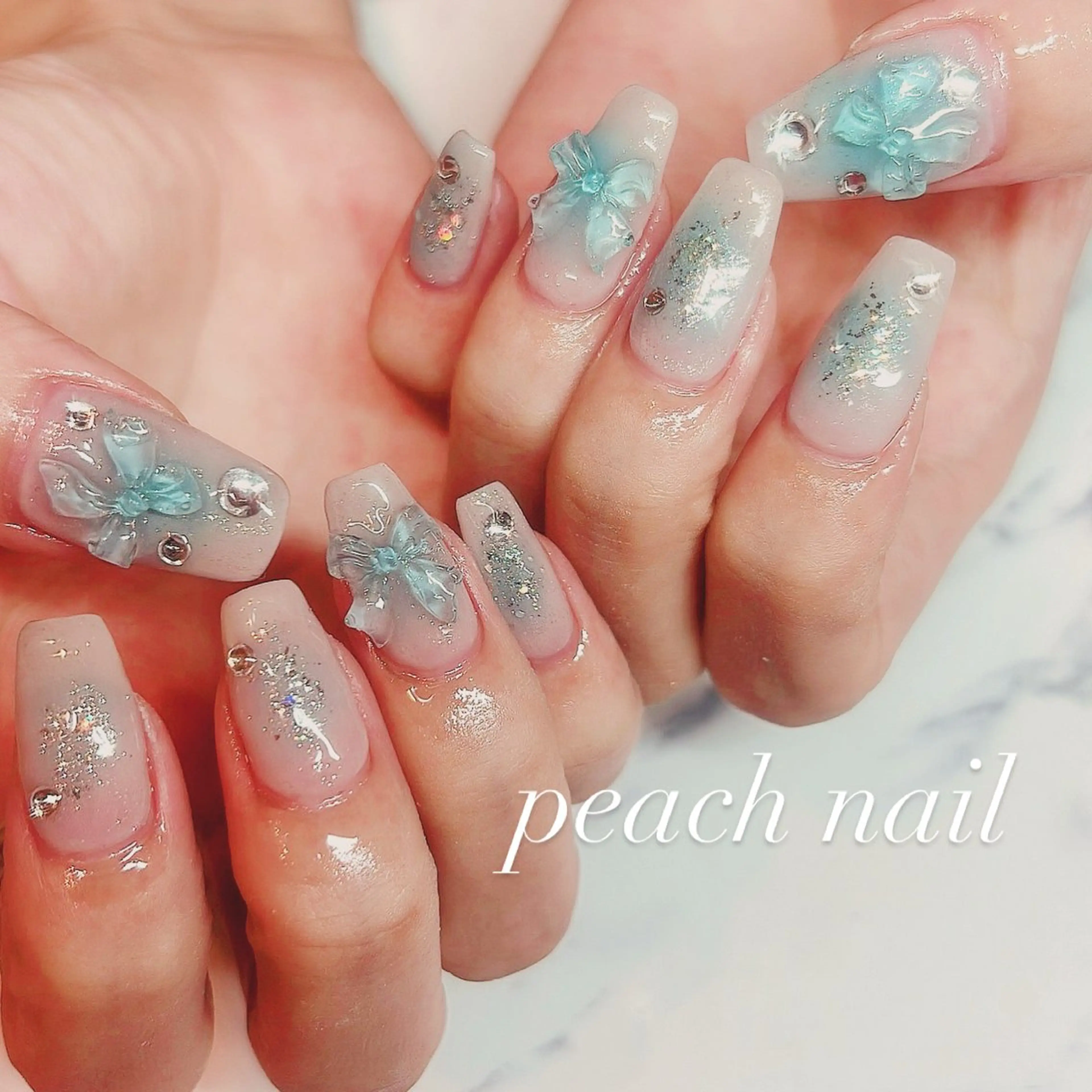 ネイル ブルー チークネイル クリアネイル 韓国ネイル リボン ハンドネイル . kiyomiのネイルデザイン