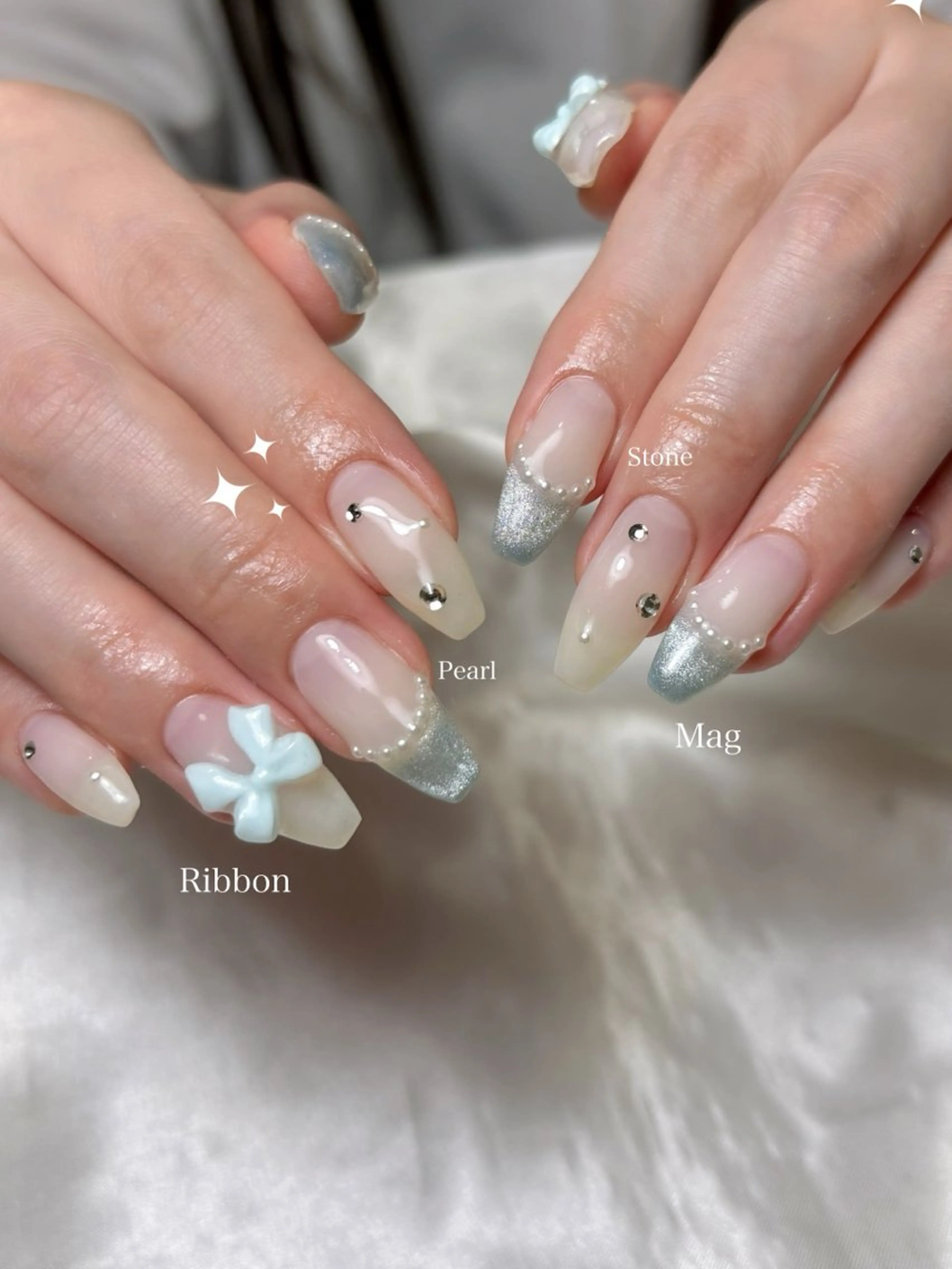 ネイル ブルー パステルネイル リボン mofie🤍ユミ/ 恵比寿/パラジェルのネイルデザイン