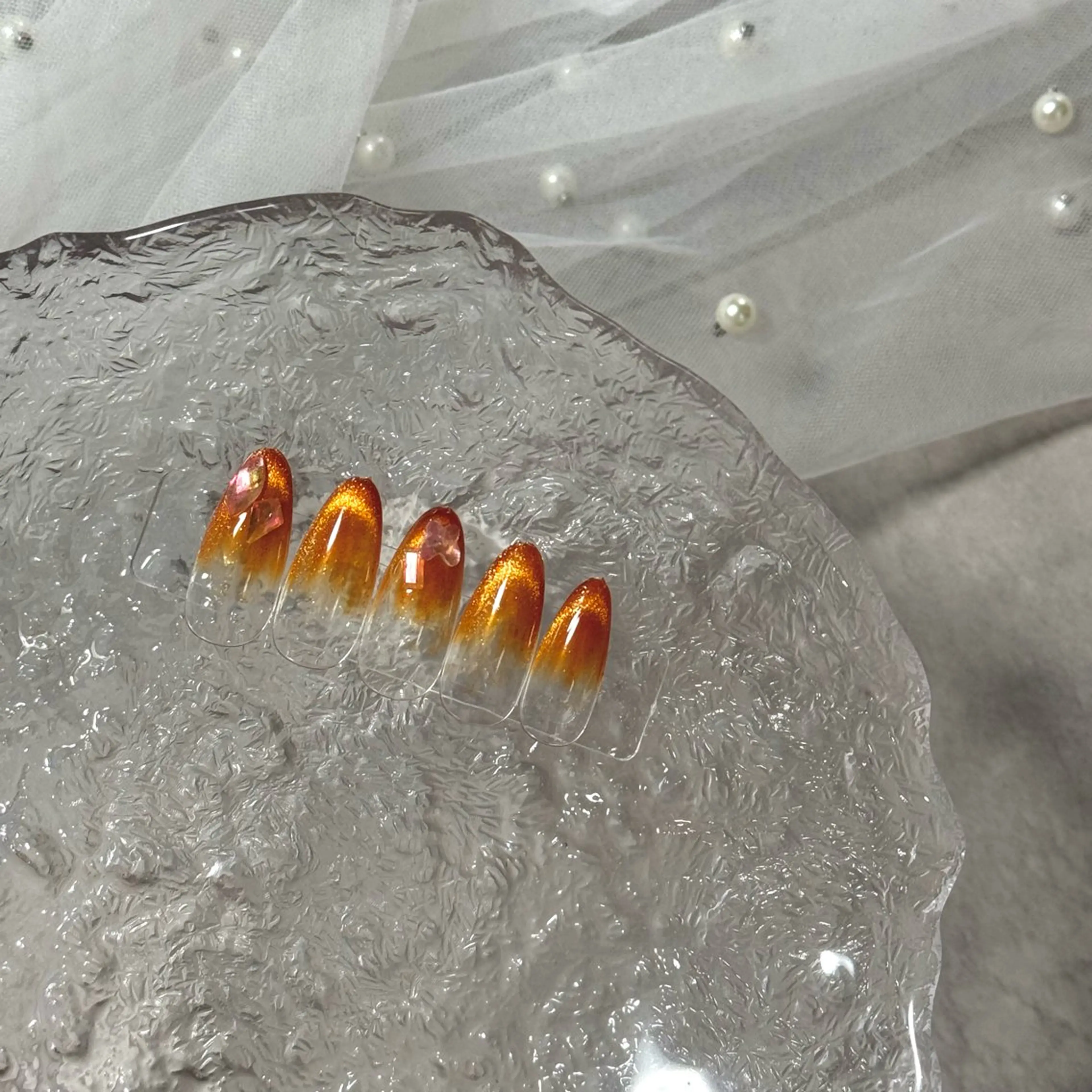 ネイル オーロラネイル グラデーション マグネットネイル オレンジ VENa eye＆ nail salonのマツエク・マツパデザイン