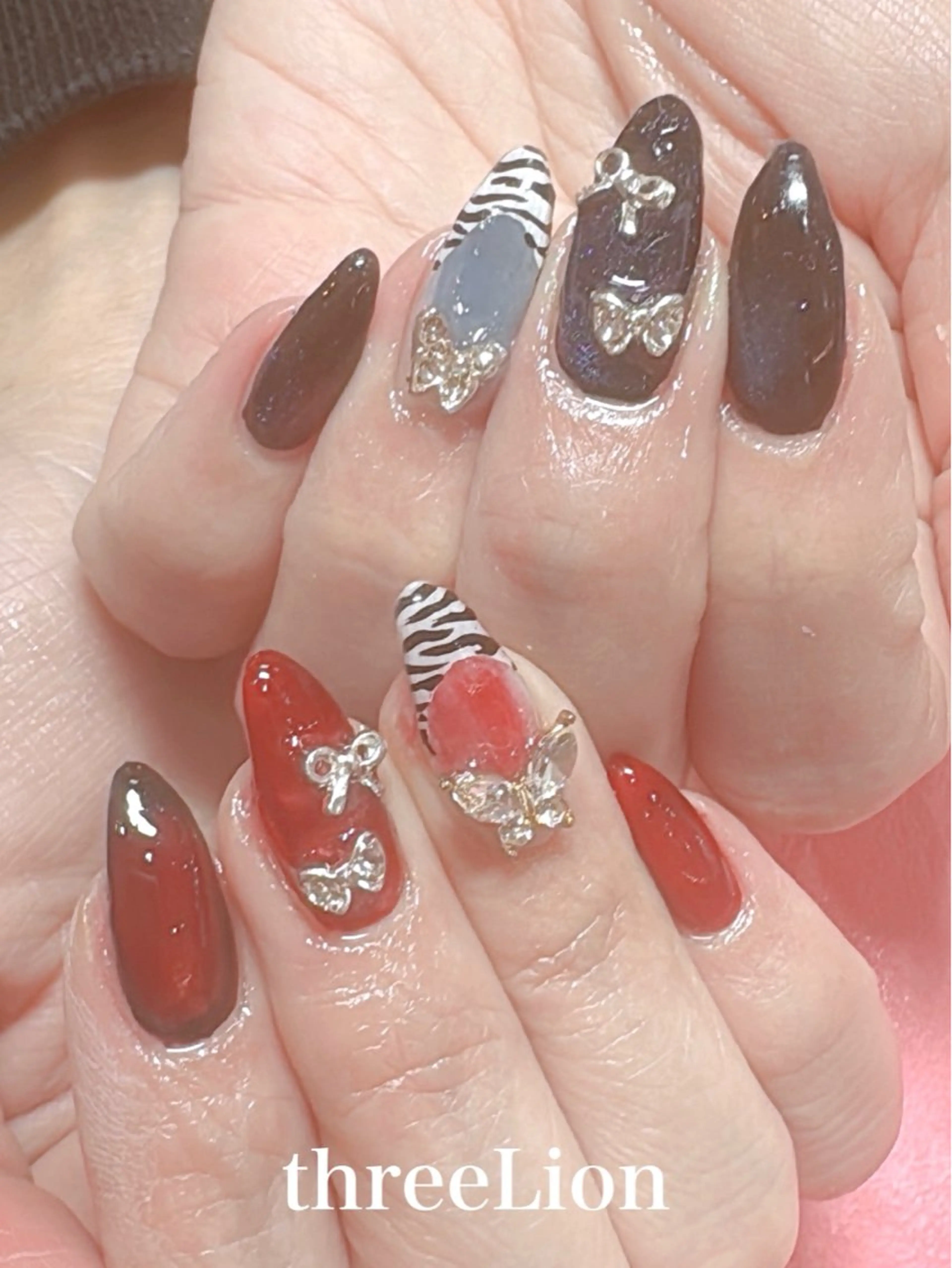 ネイル アニマル柄 リボン ハンドネイル threeLion ネイル&アイラッシュのネイルデザイン