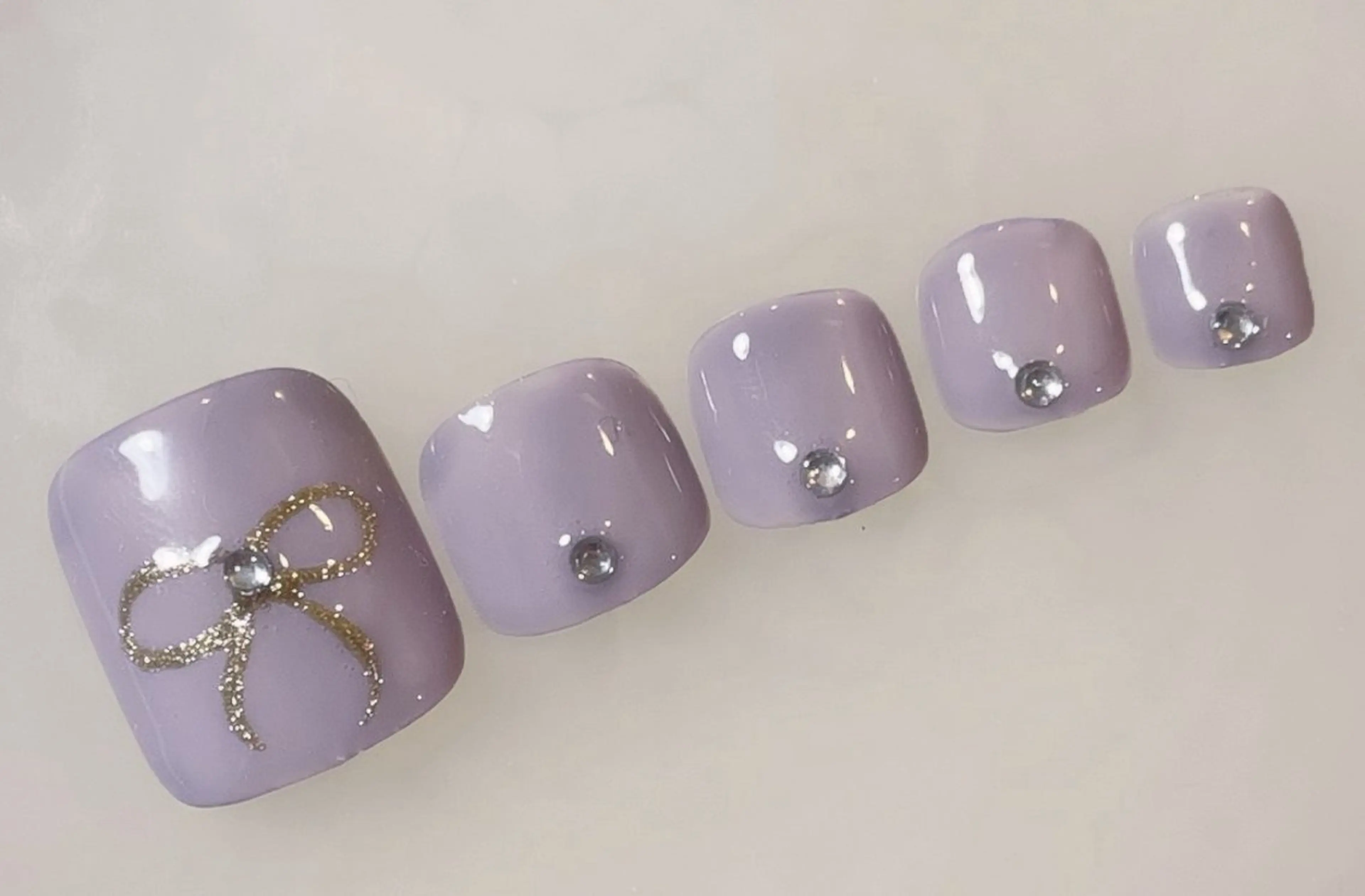 ネイル フットネイル リボン koto nailsのネイルデザイン