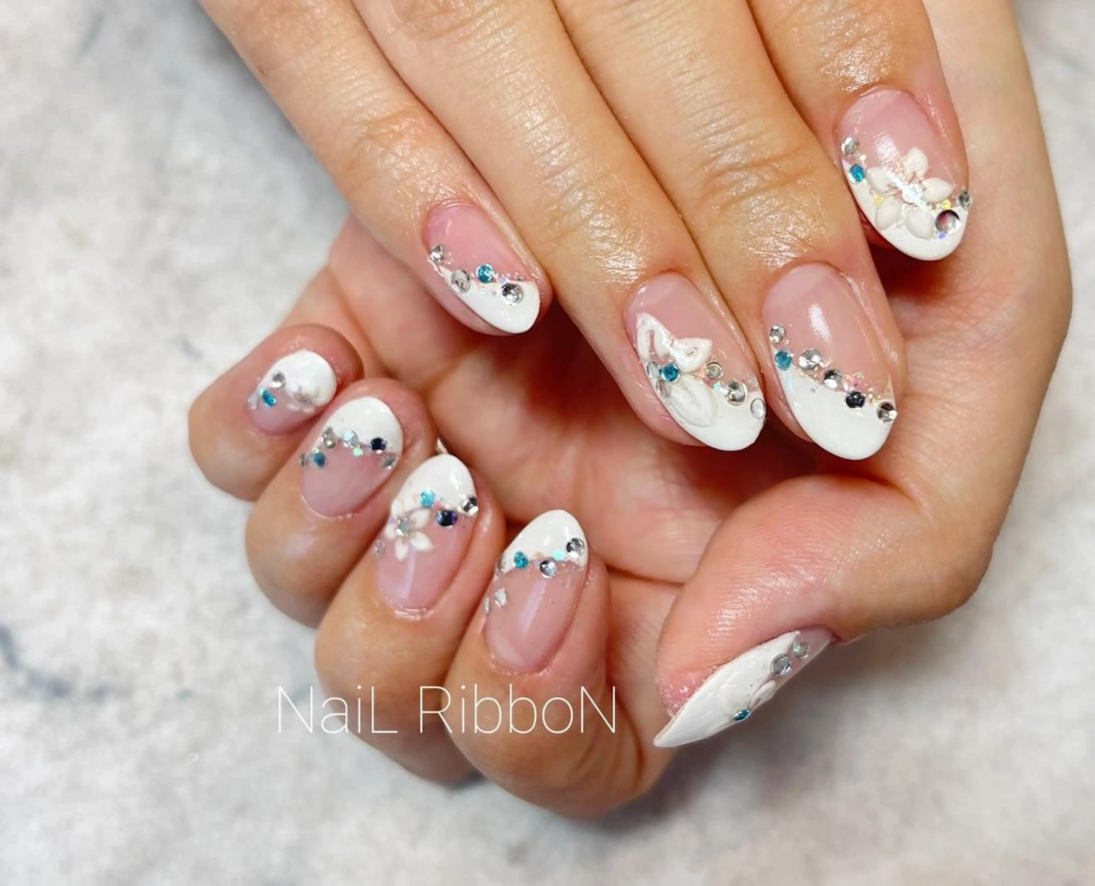 ネイル ネイルリボン 受付スタッフのネイルデザイン