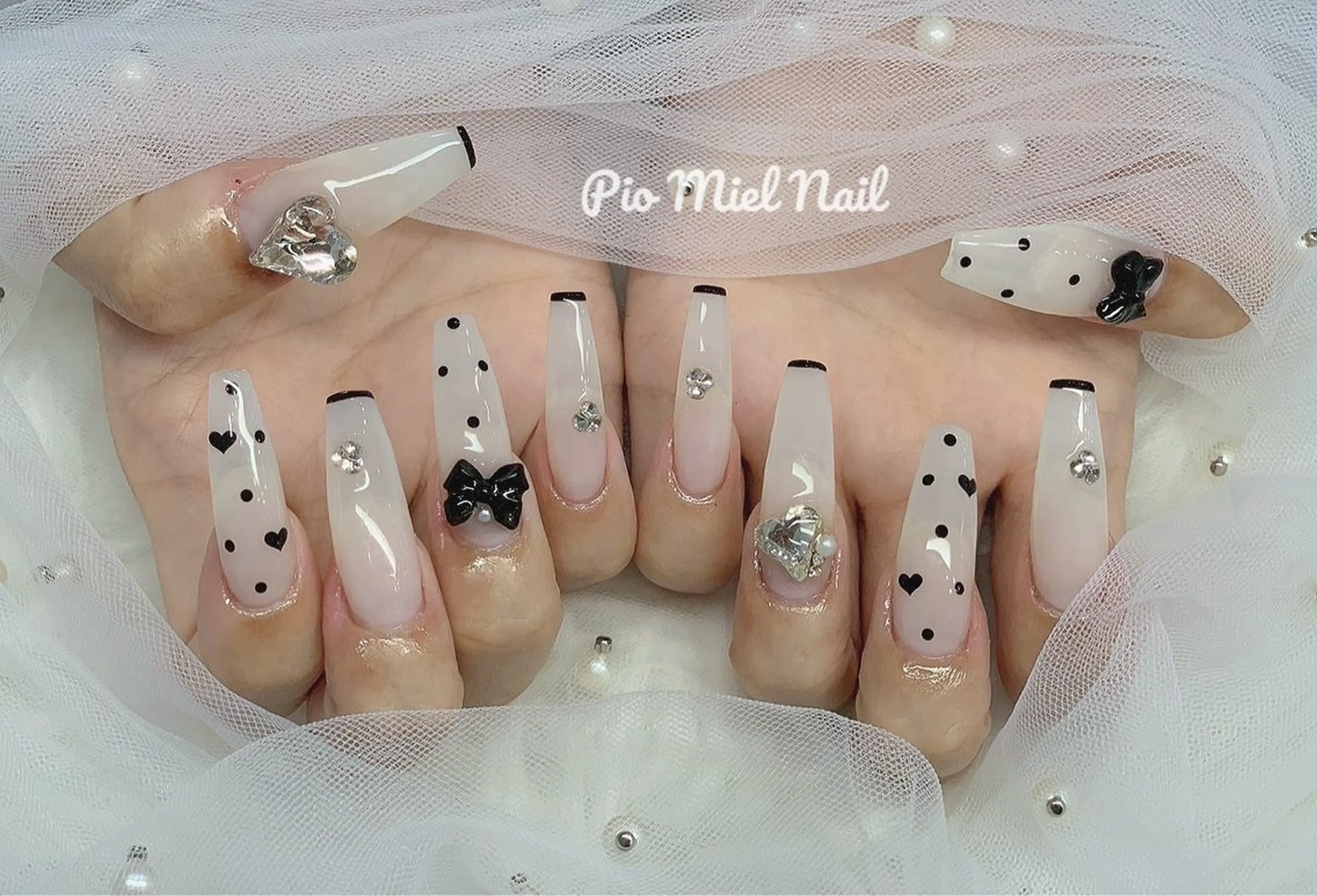 ロング ハンドネイル ハンドケア Pio Mielのネイルデザイン