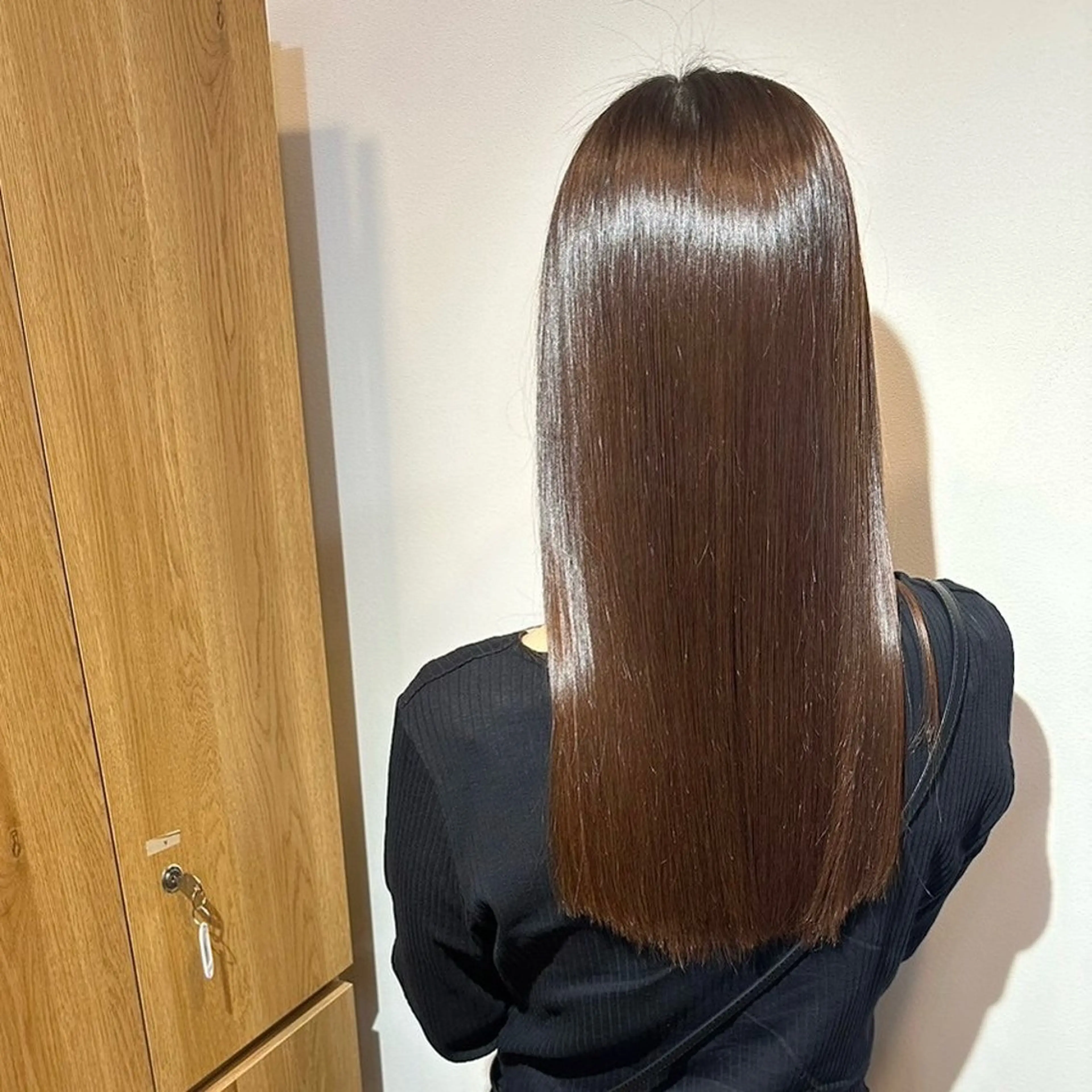 ロング 岡田 佳子のヘアスタイル