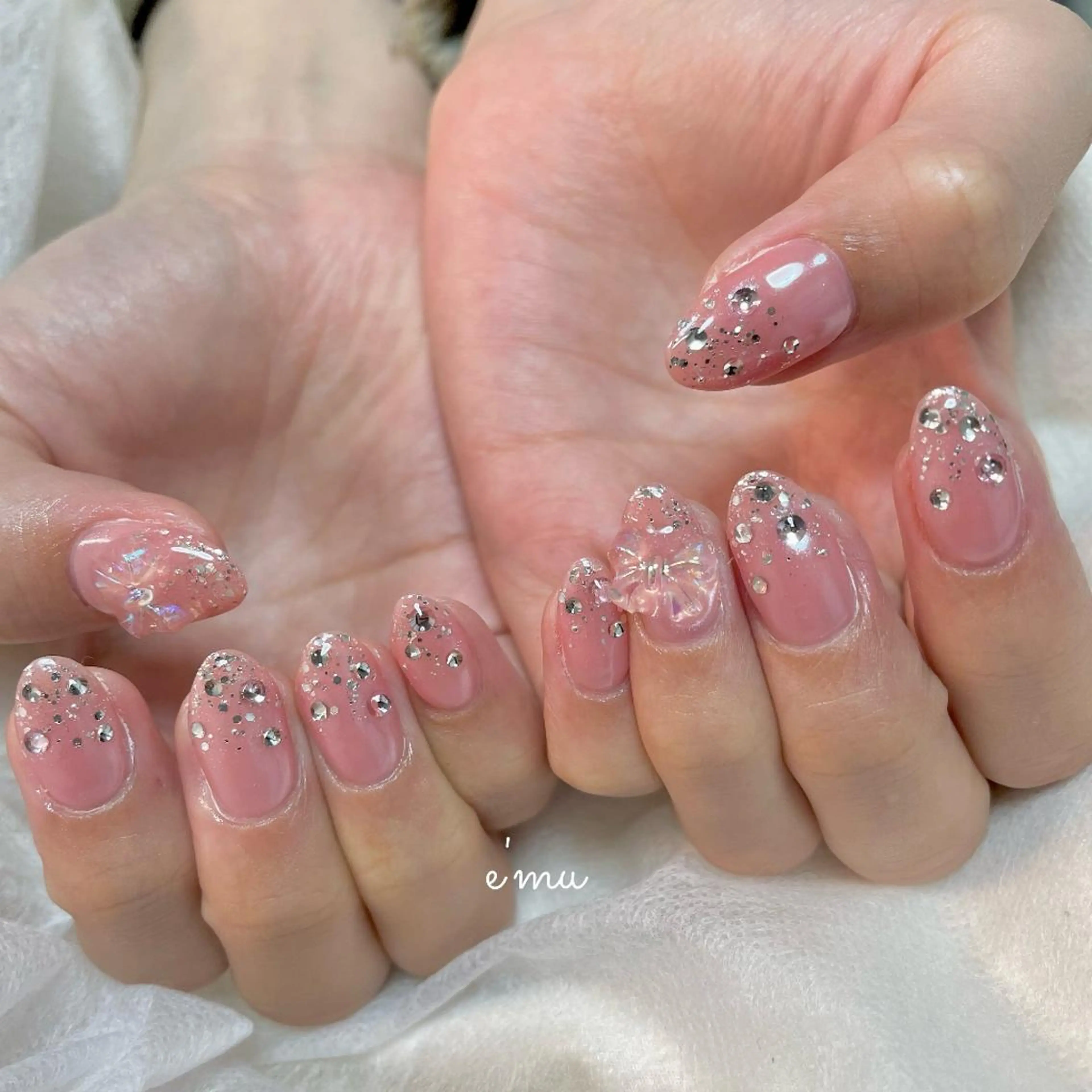 ネイル キラキラネイル ピンク リボン nail salon e'mu💐のネイルデザイン