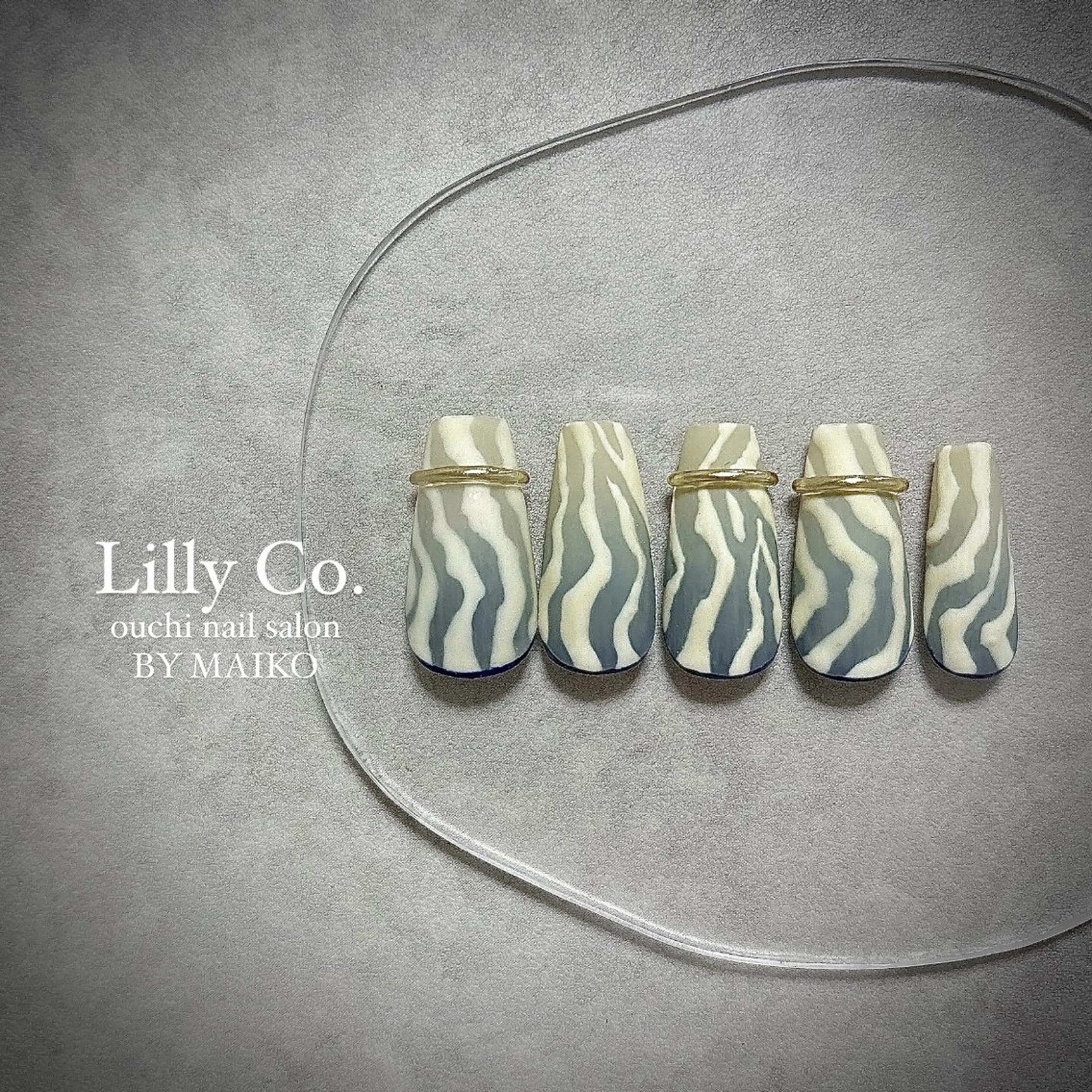 ネイル アニマル柄 グラデーション ハンドネイル ハンドケア Lilly Co.のネイルデザイン