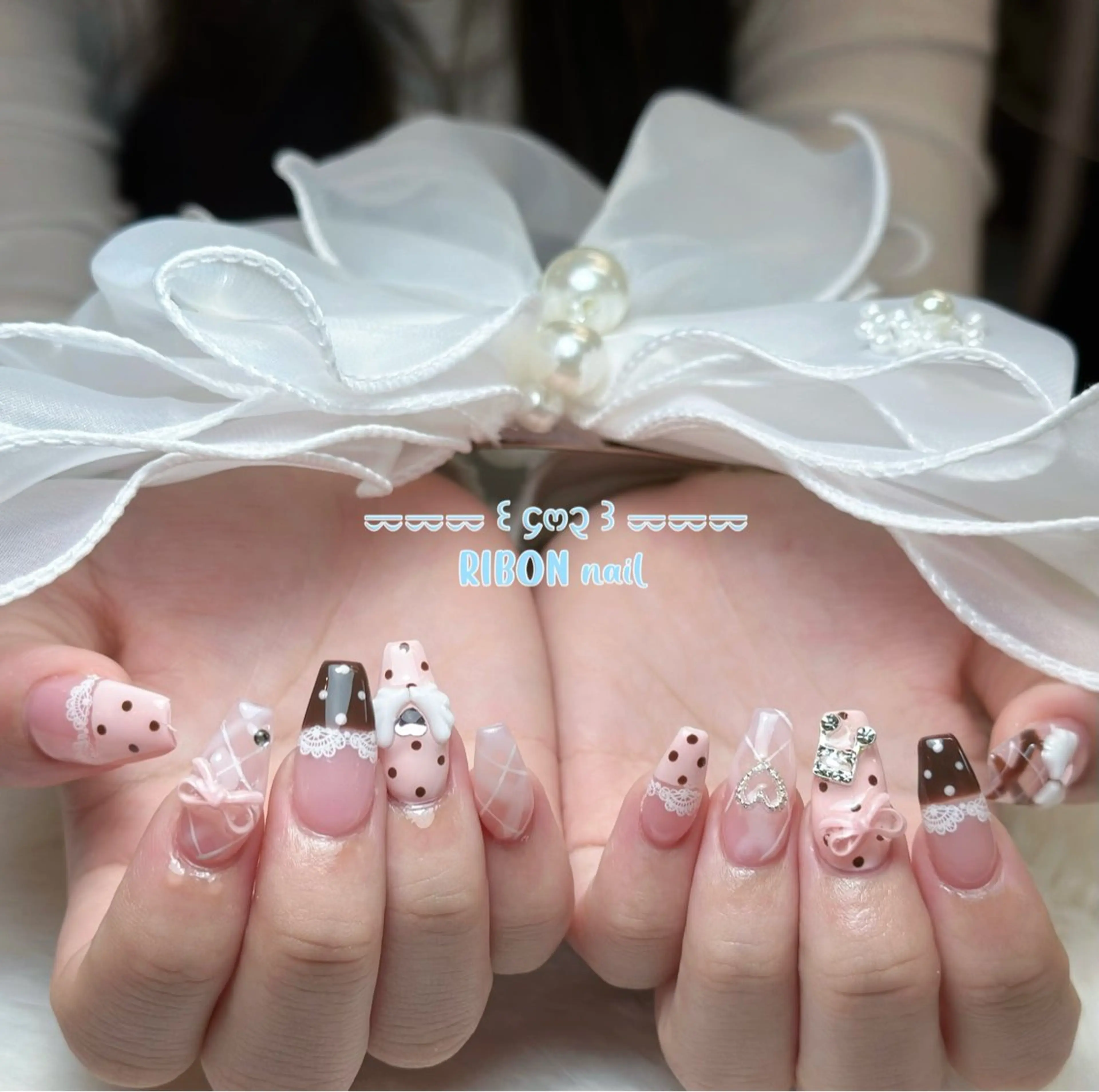 ネイル アートネイル 成人式 長さ出し キラキラネイル ロングネイル ハンドネイル RIBON nail salonのネイルデザイン