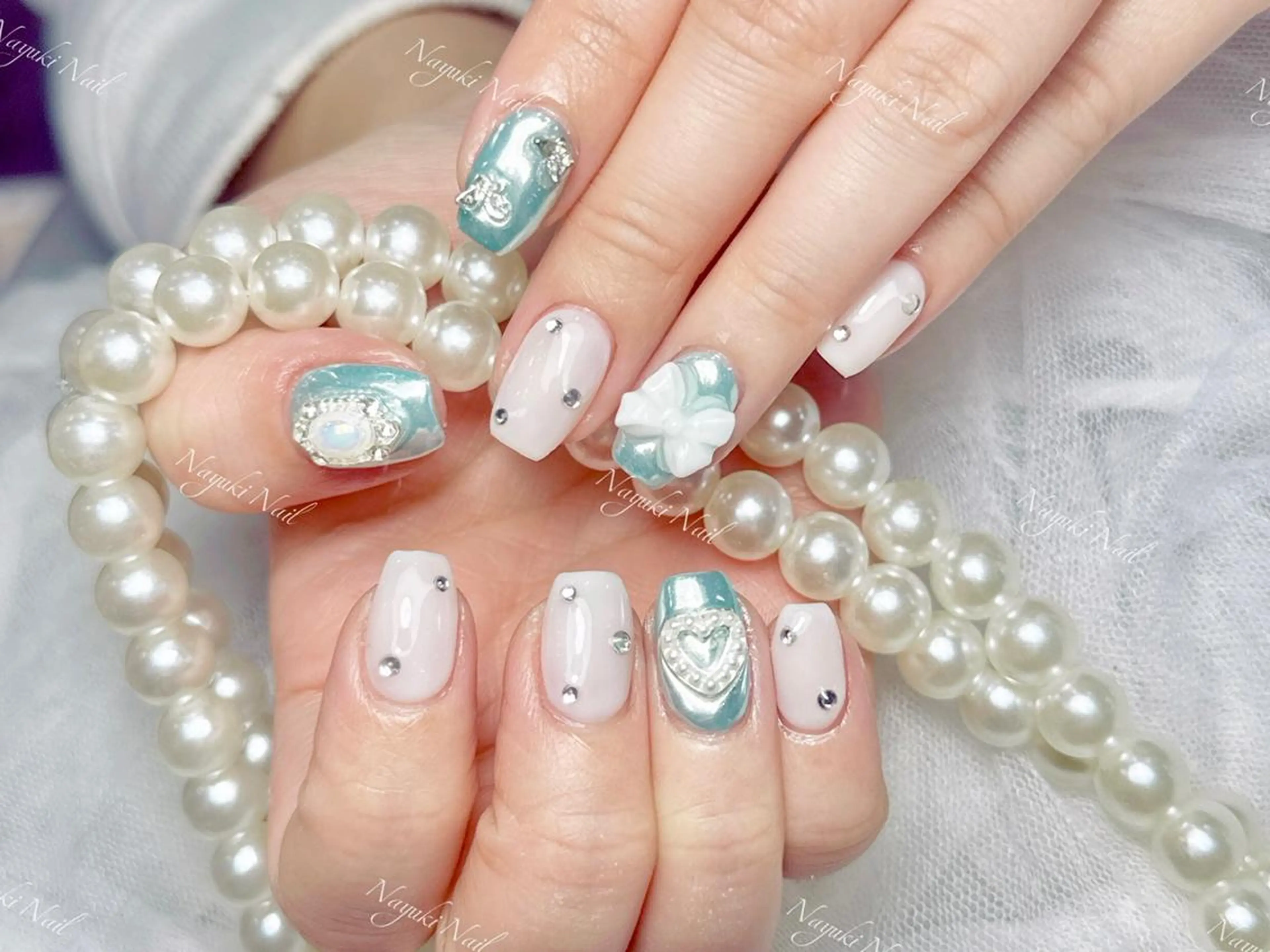 ネイル 🦋 Queenieのネイルデザイン