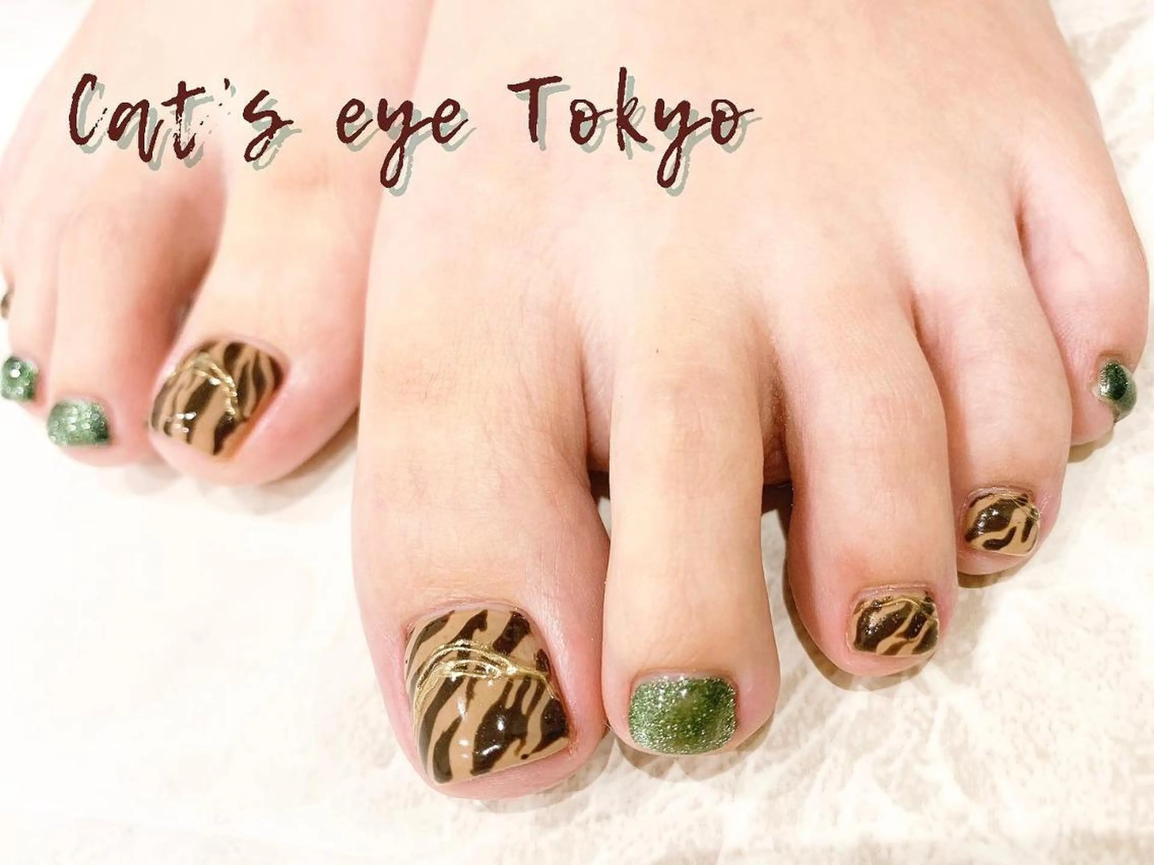 ネイル マツエク・マツパ アニマル柄 アートネイル Cat's eye TOKYO 新宿店のネイルデザイン