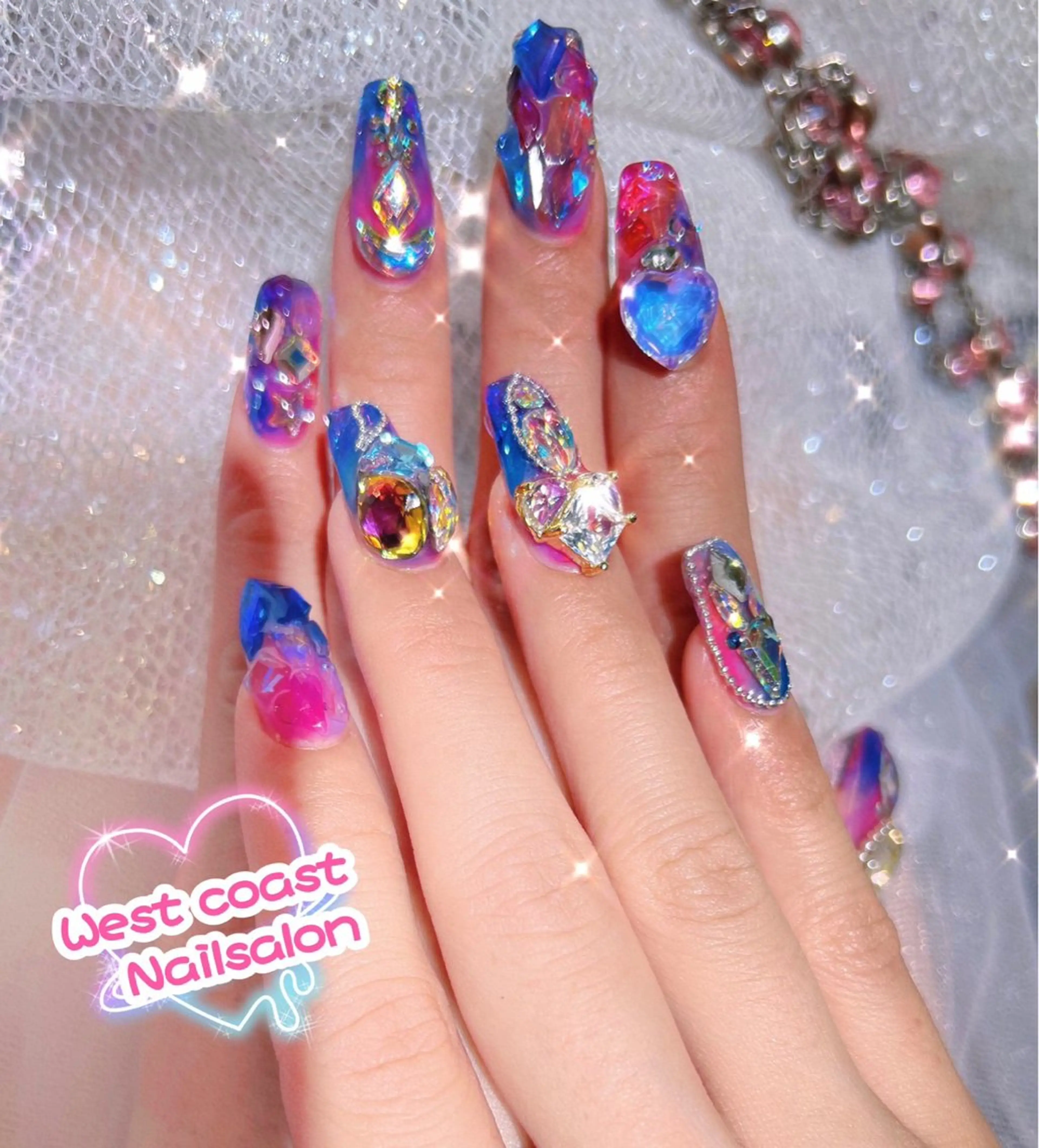 ネイル ストーンネイル リボン、ガーリー パーツ放題専門店のネイルデザイン