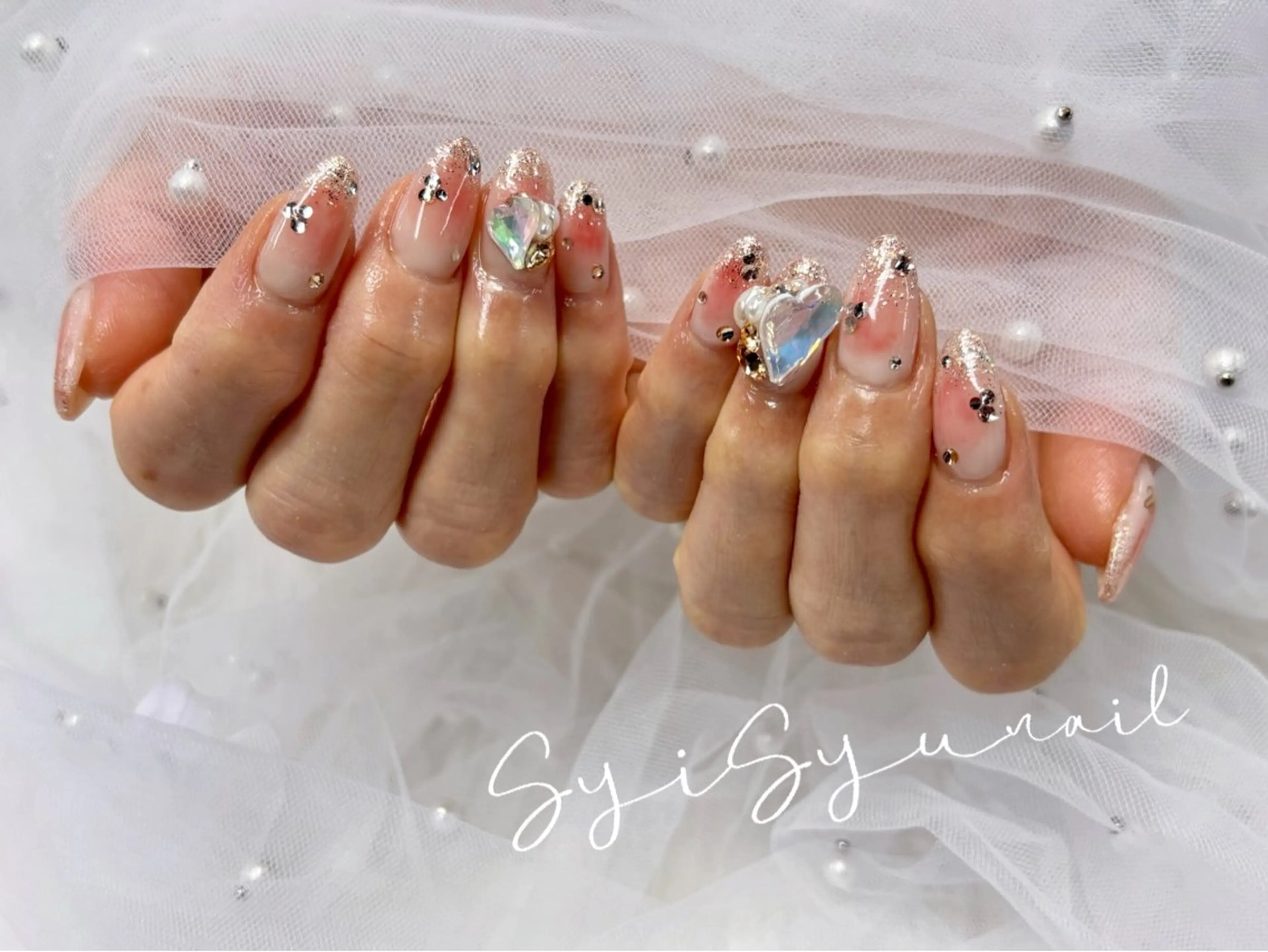 セミロング SyiSyu なんば本店のネイルデザイン