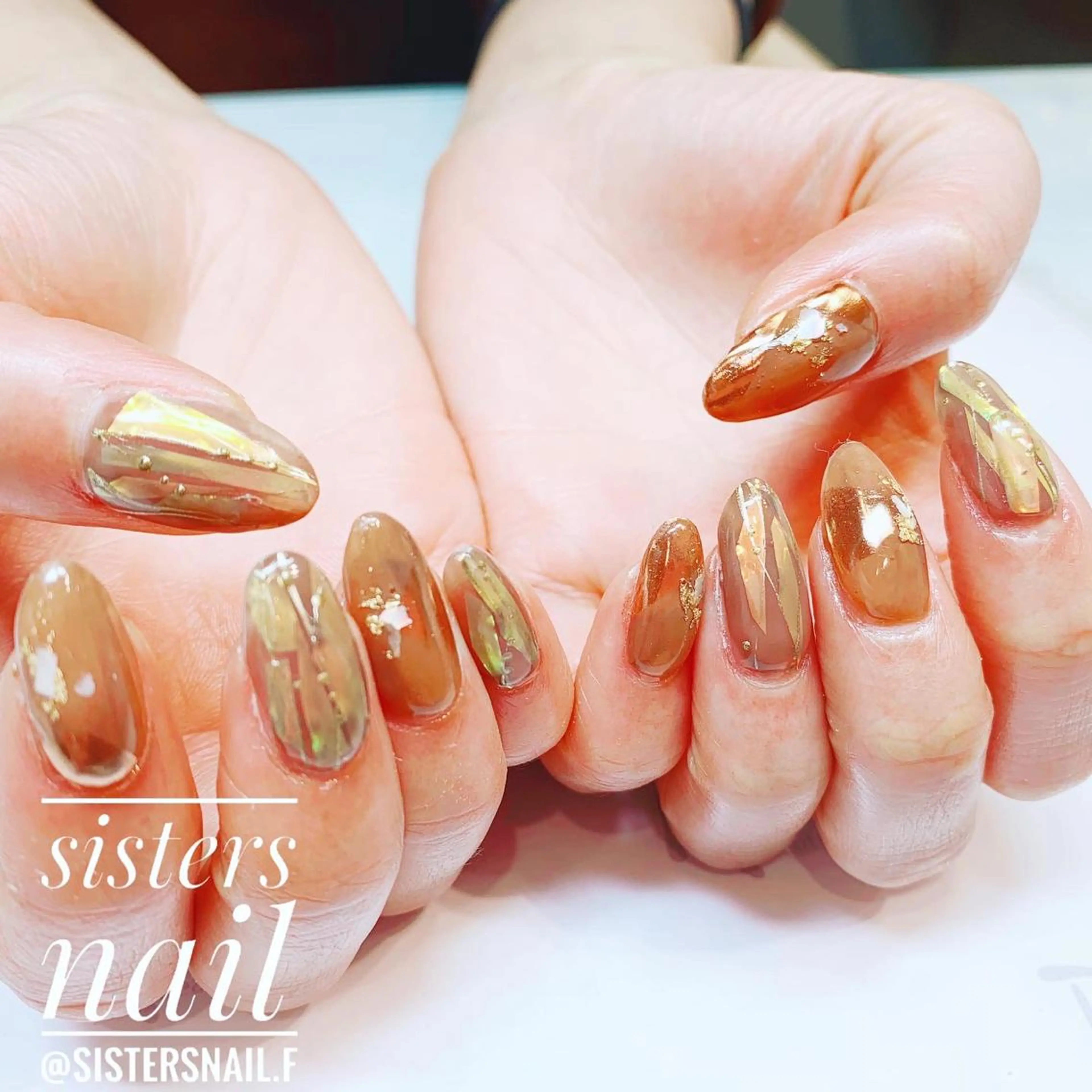 ネイル アートネイル オーロラネイル ブラウン ホログラムネイル キラキラネイル sisters nail.fのネイルデザイン