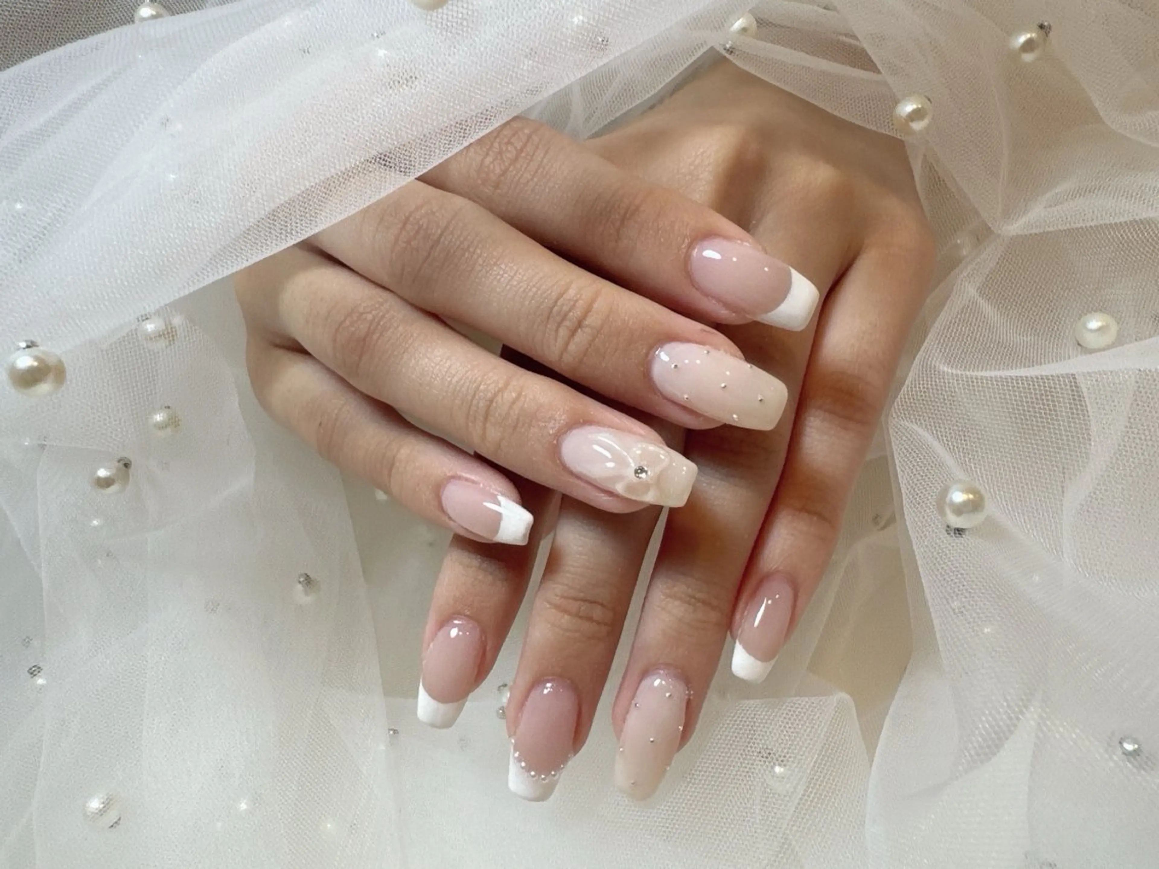 ネイル アートネイル フレンチネイル リボン yglow 【yuri】のネイルデザイン