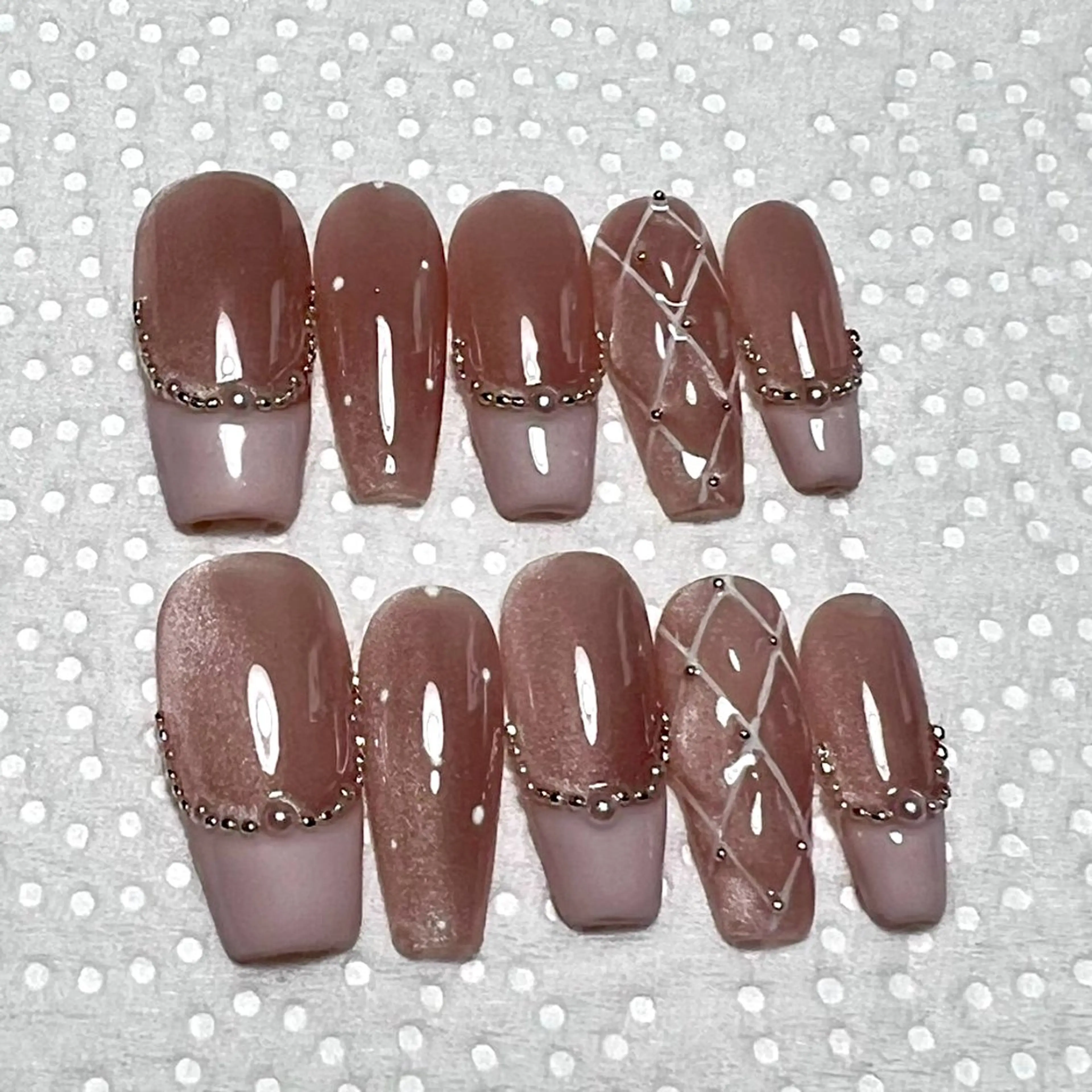 画像のデザイン済みチップ装着🩵の写真