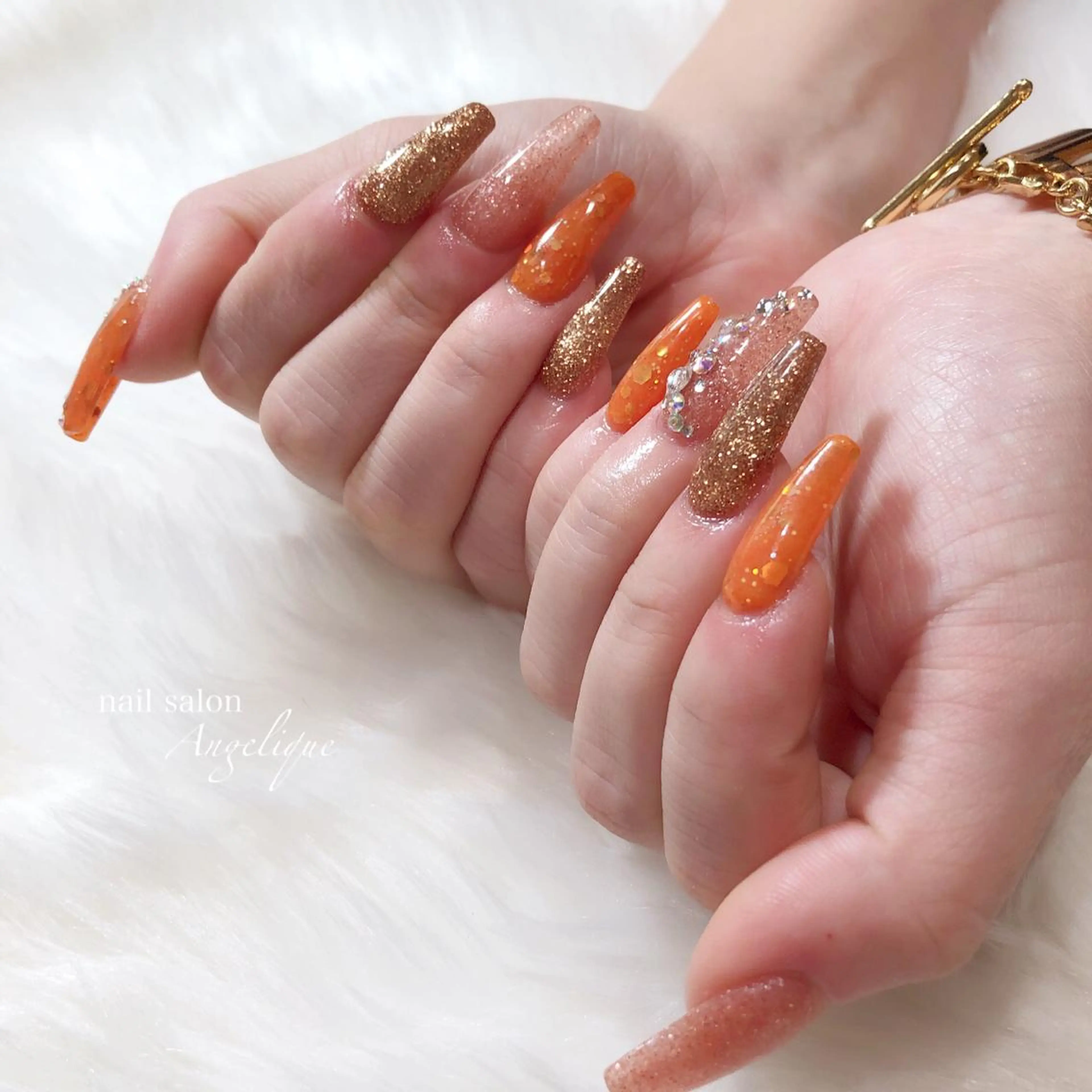 ネイル ゴールド オレンジ Nail salon Angeliqueのネイルデザイン