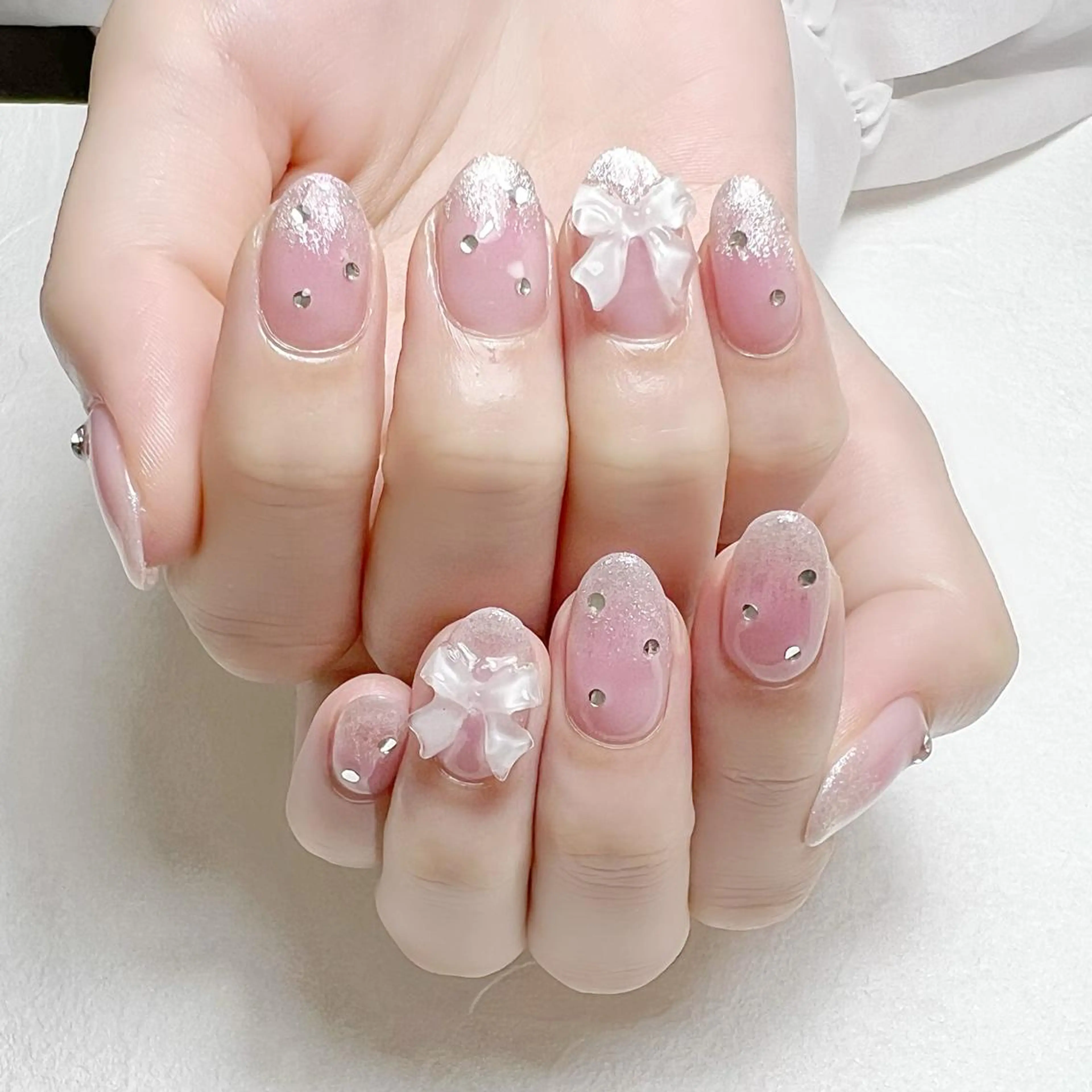 ネイル チークネイル グラデーション マグネットネイル ピンク リボン rouse nail RISATOのネイルデザイン