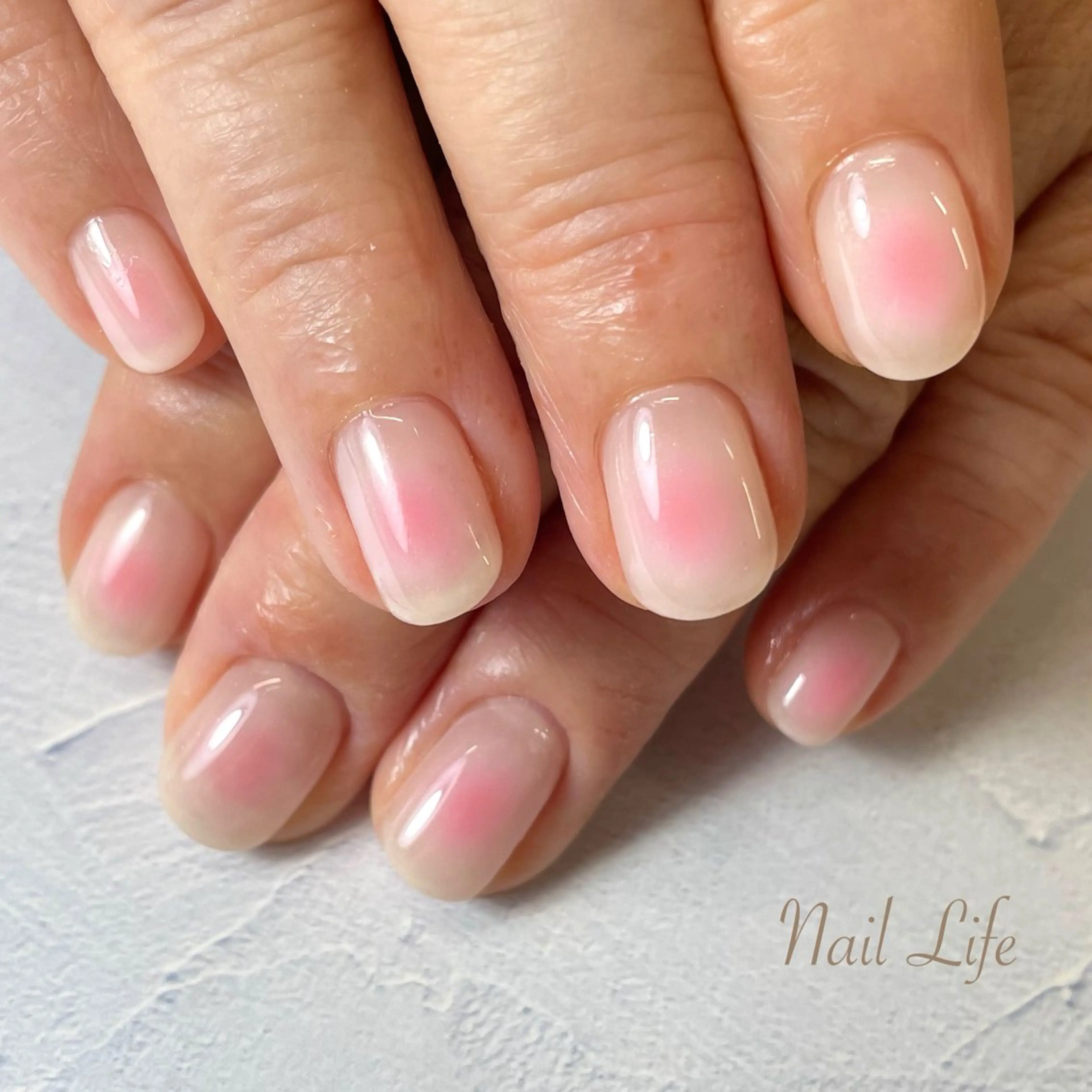 ネイル チークネイル ホワイト 大嶋 めぐみのネイルデザイン