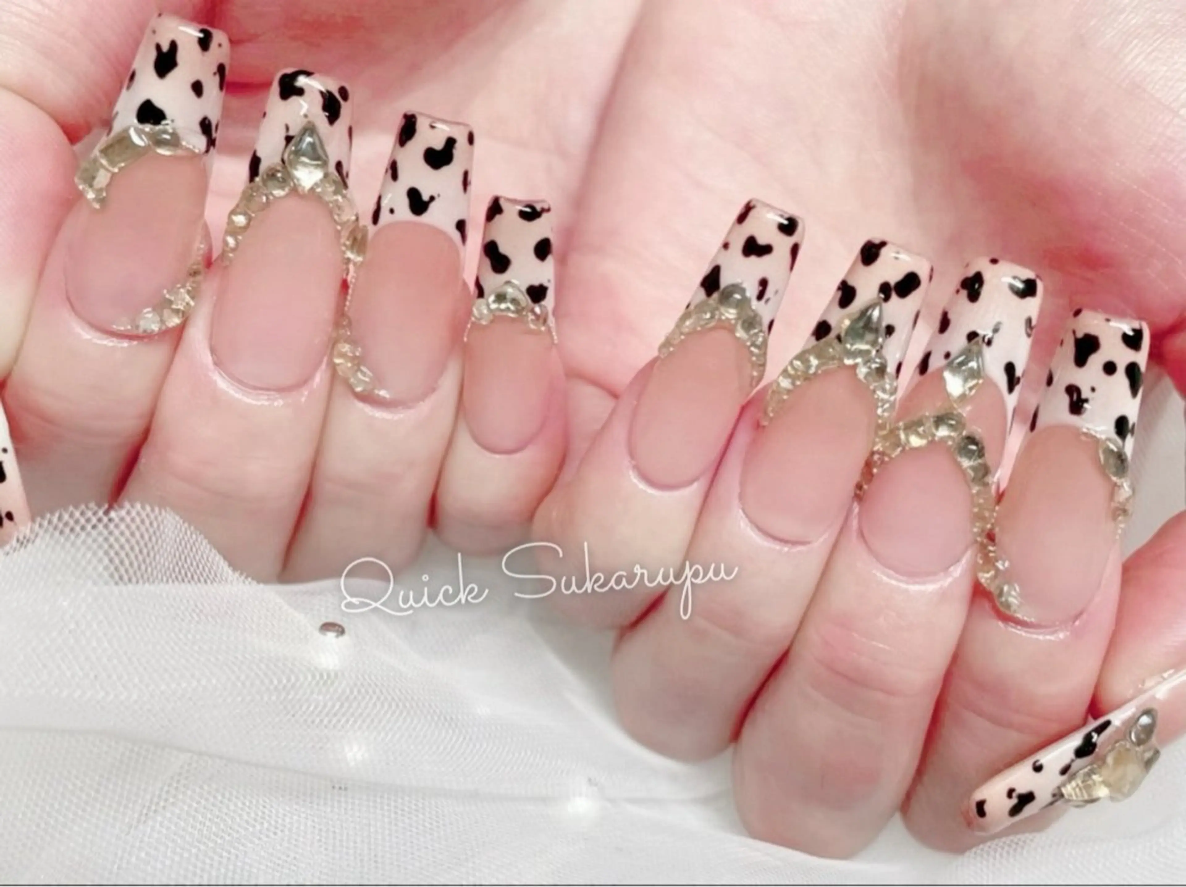 ロング ハンドネイル Quick Sukarupuのネイルデザイン