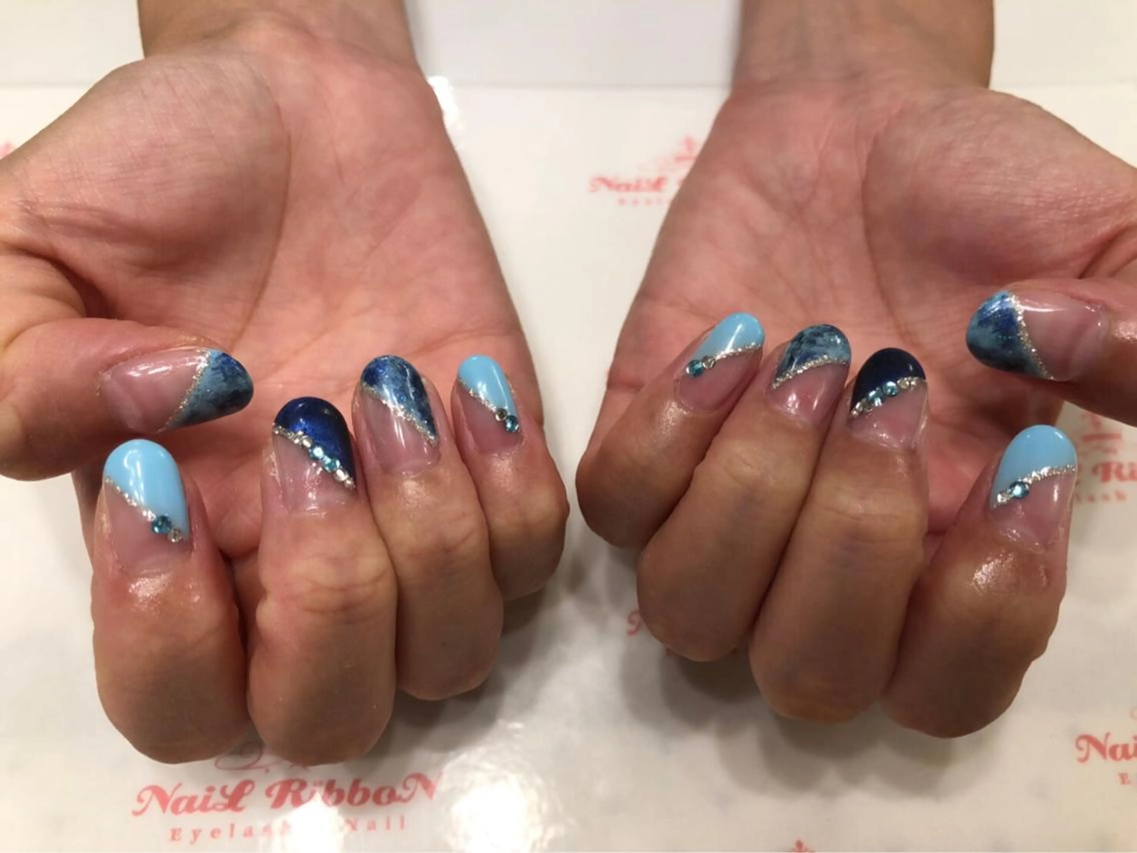 ネイル 春ネイル ネイルリボン 受付スタッフのネイルデザイン