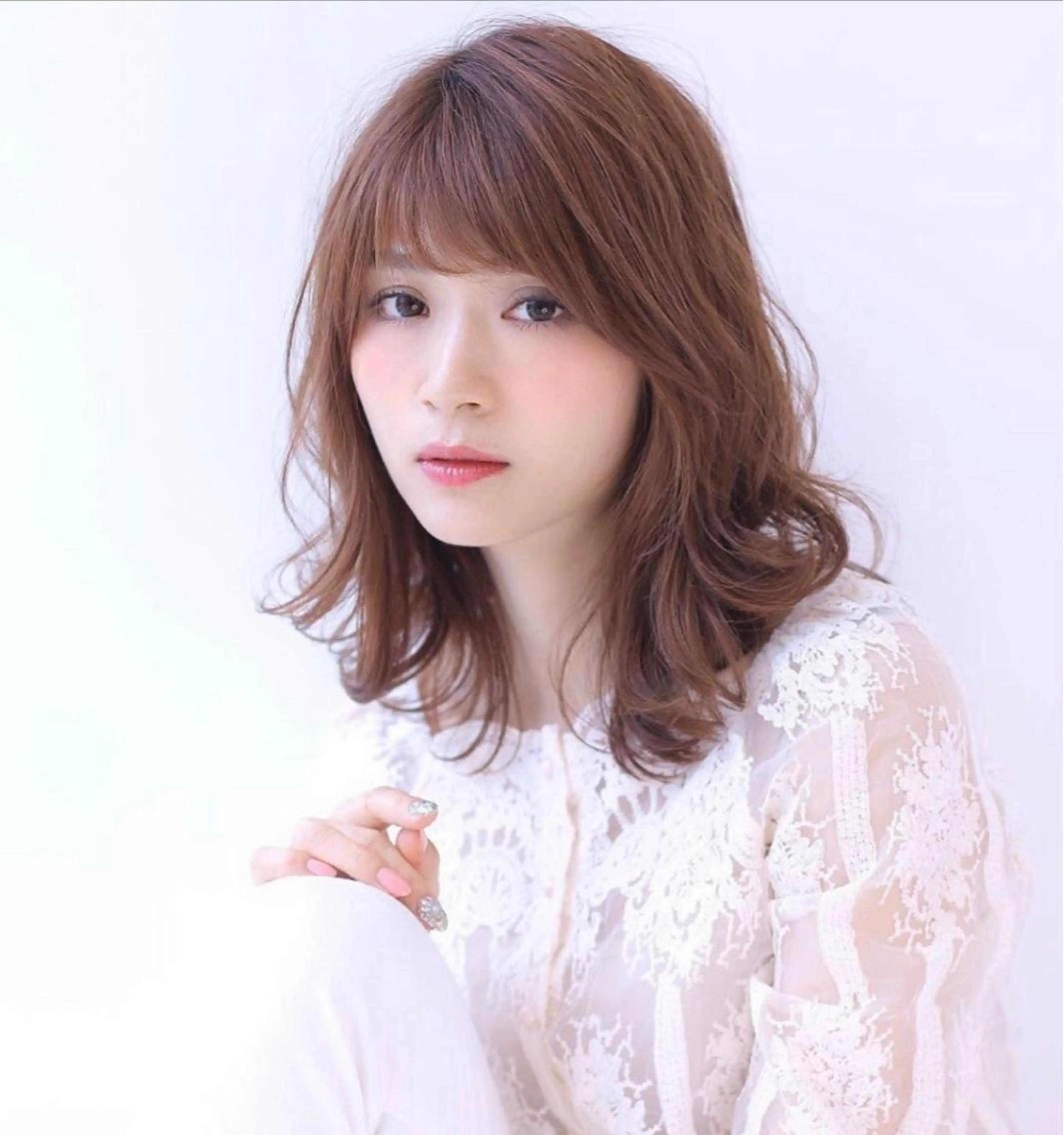 セミロング ORO　飯田 早稀のヘアスタイル