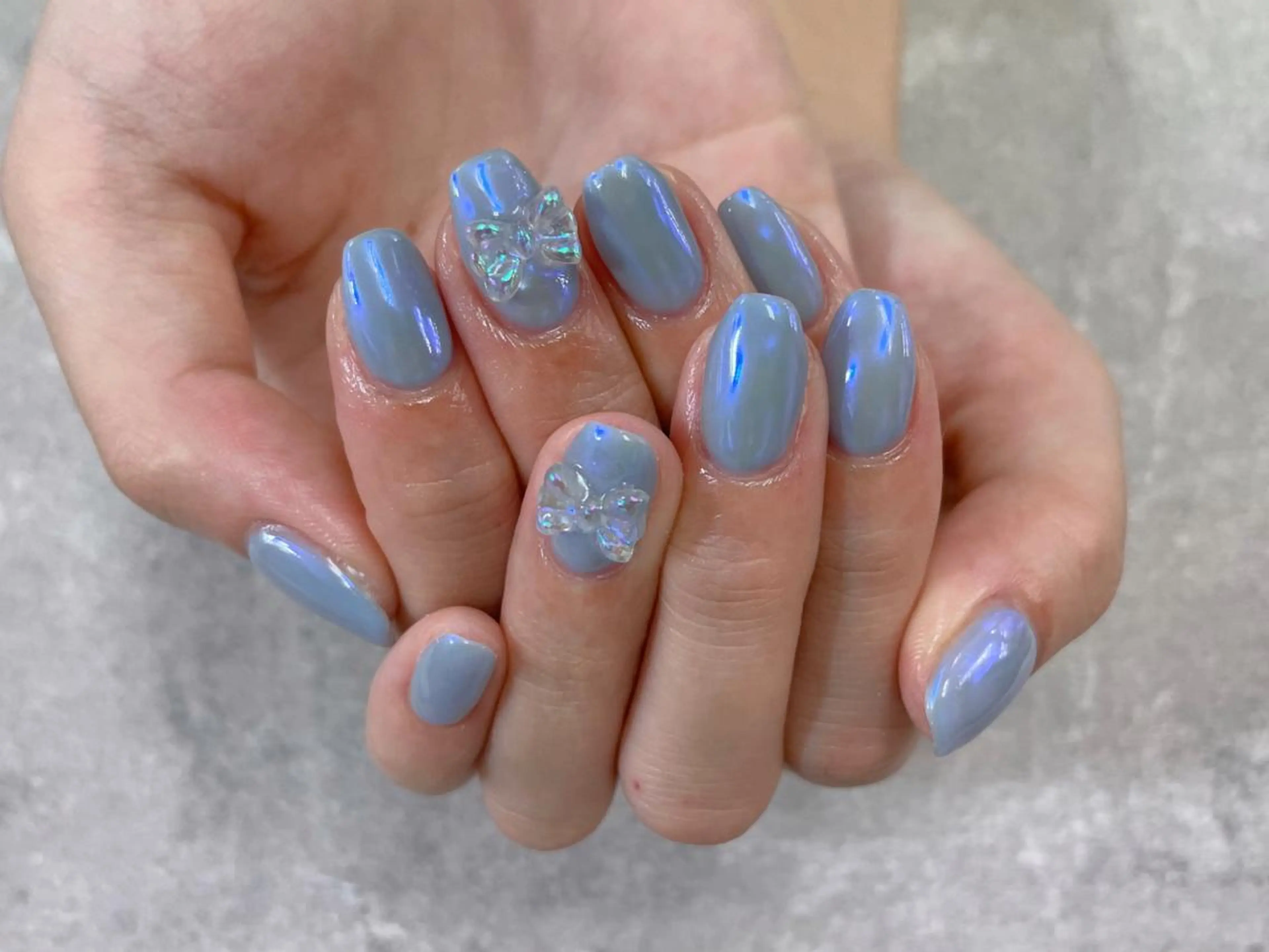 ネイル オーロラネイル ブルー 水色 ワンカラーネイル リボン ハンドネイル foglia❁﻿. ⌇﻿imamuraのネイルデザイン
