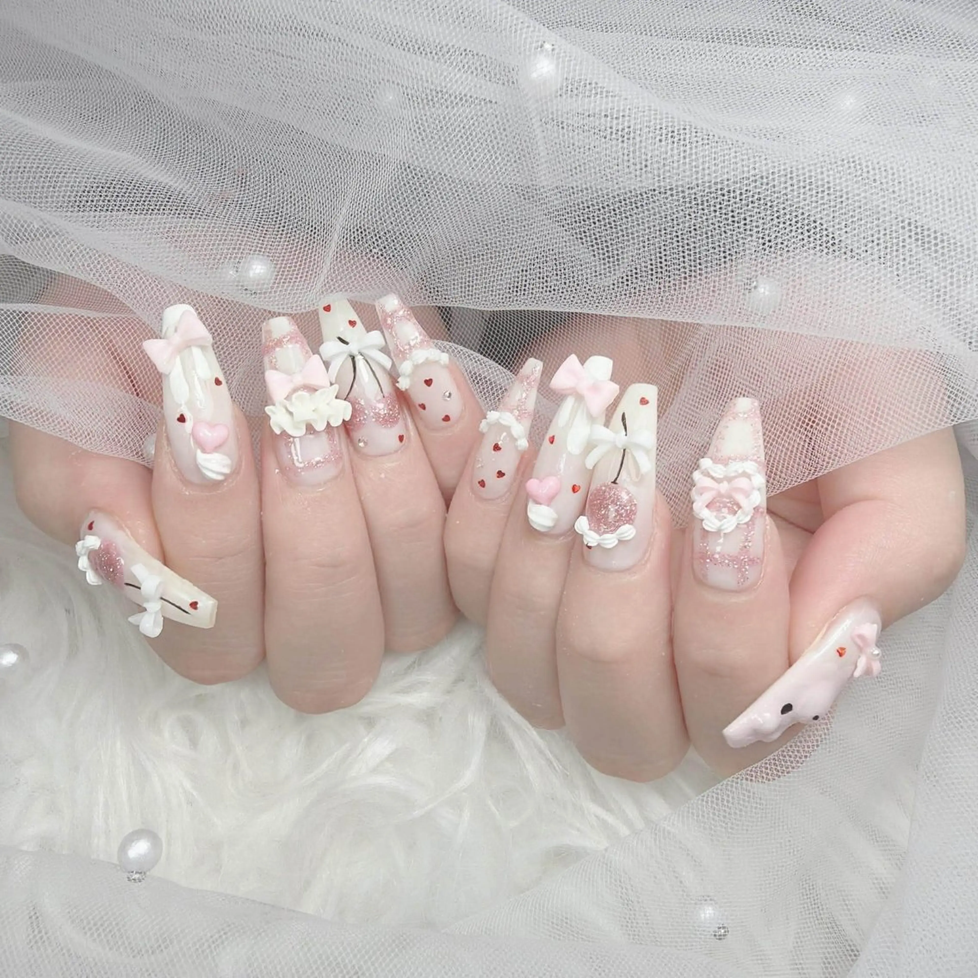 ネイル ハート リボン 春ネイル ハンドネイル ハンドケア Gote Kawa nail salonのネイルデザイン