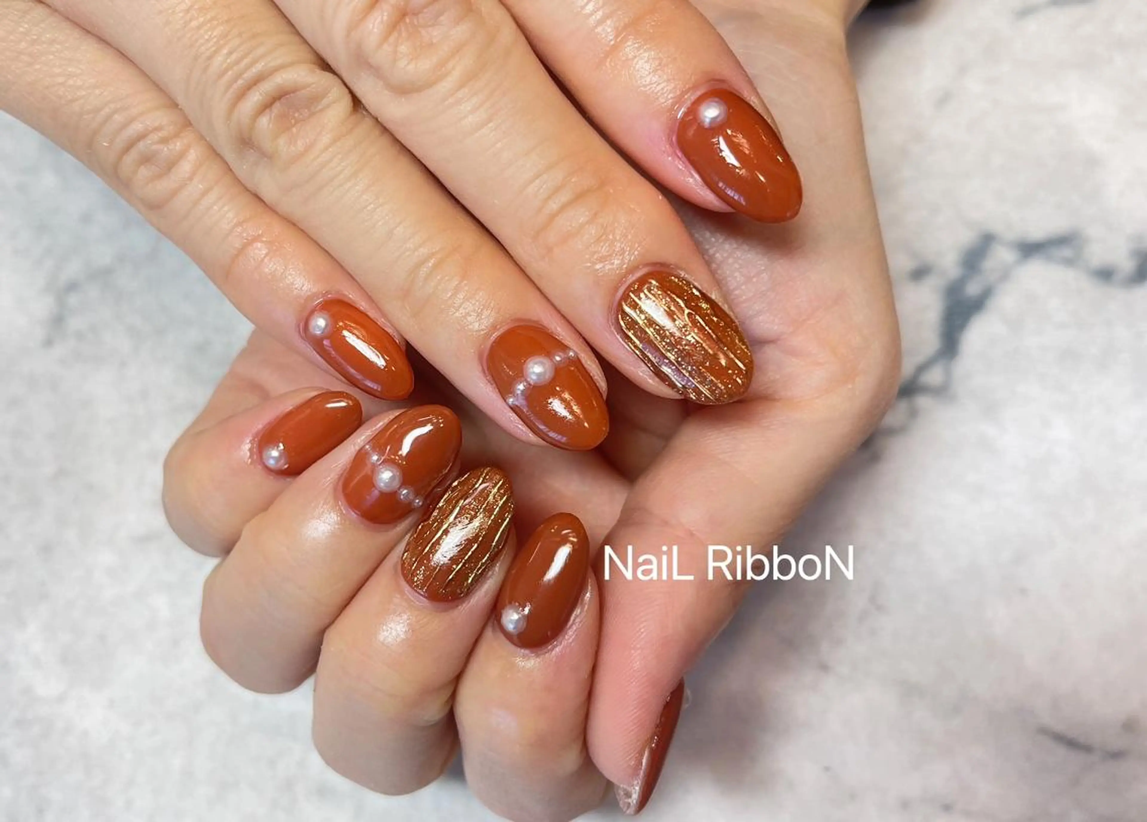 ネイル ネイルリボン 受付スタッフのネイルデザイン