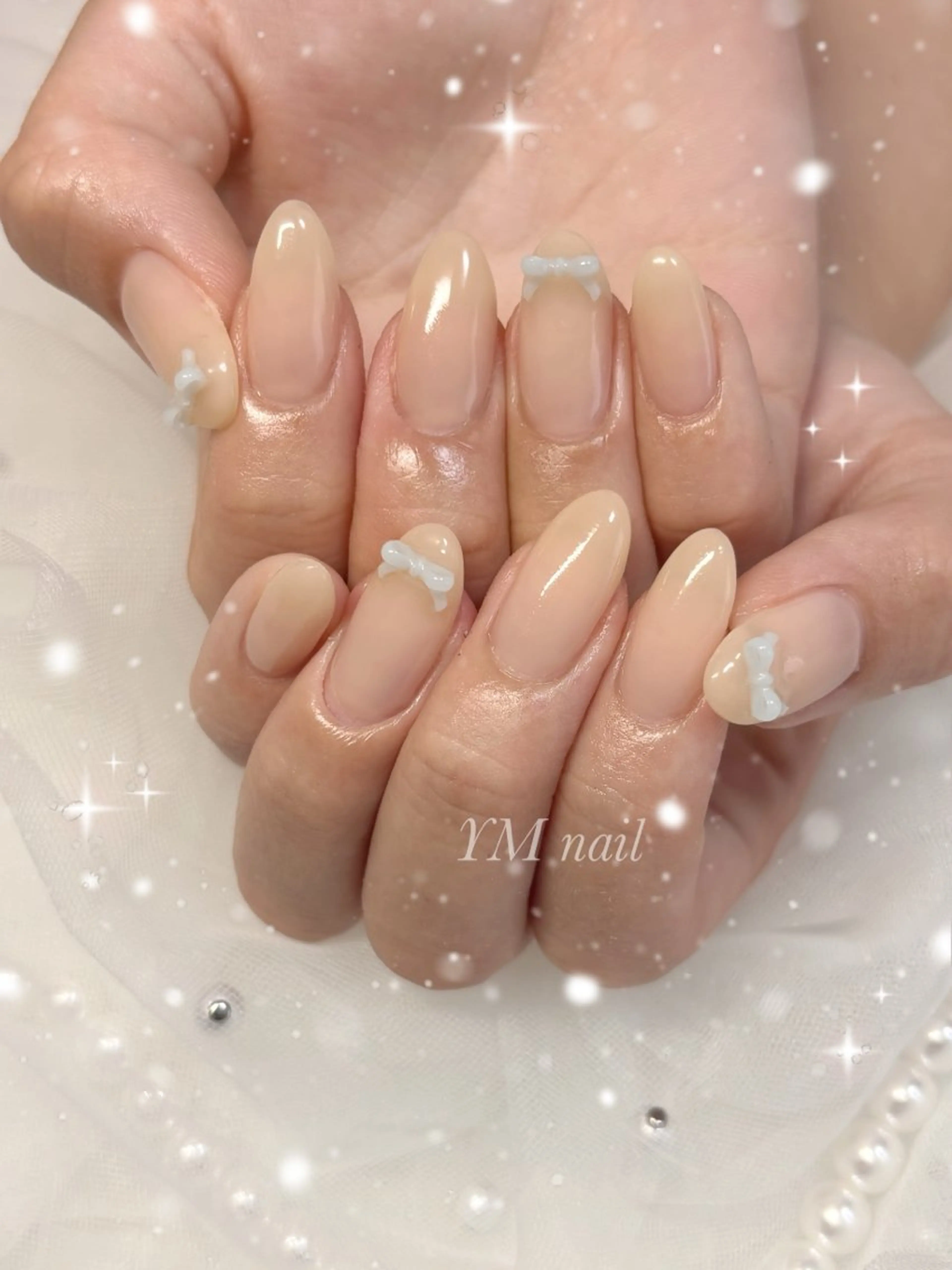 ネイル 韓国ネイル 水色 ワンカラーネイル リボン ハンドネイル YM nailのネイルデザイン