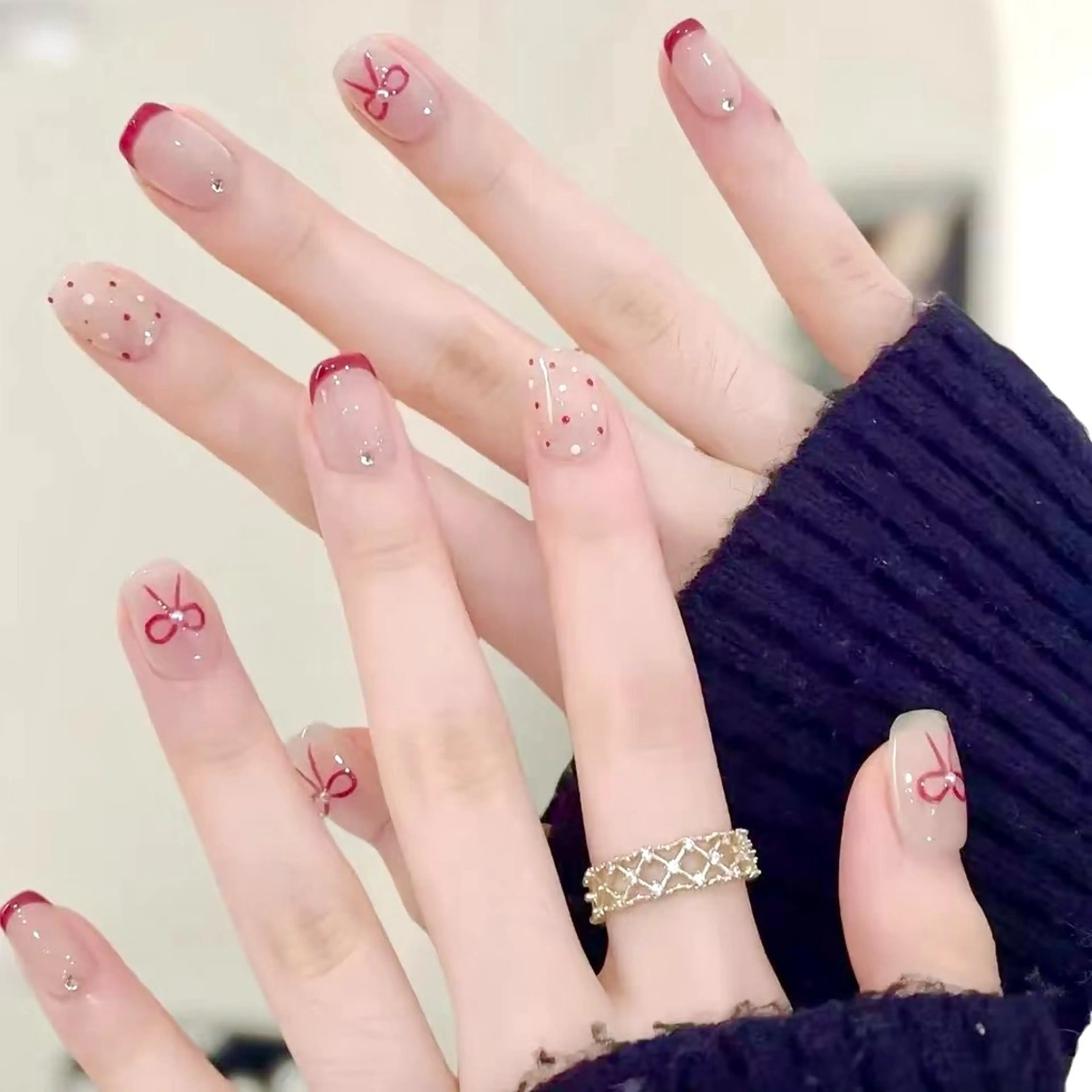 ネイル アートネイル ドット フレンチネイル 赤色 リボン ハンドネイル ハンドケア DarkHoney 池袋店のネイルデザイン