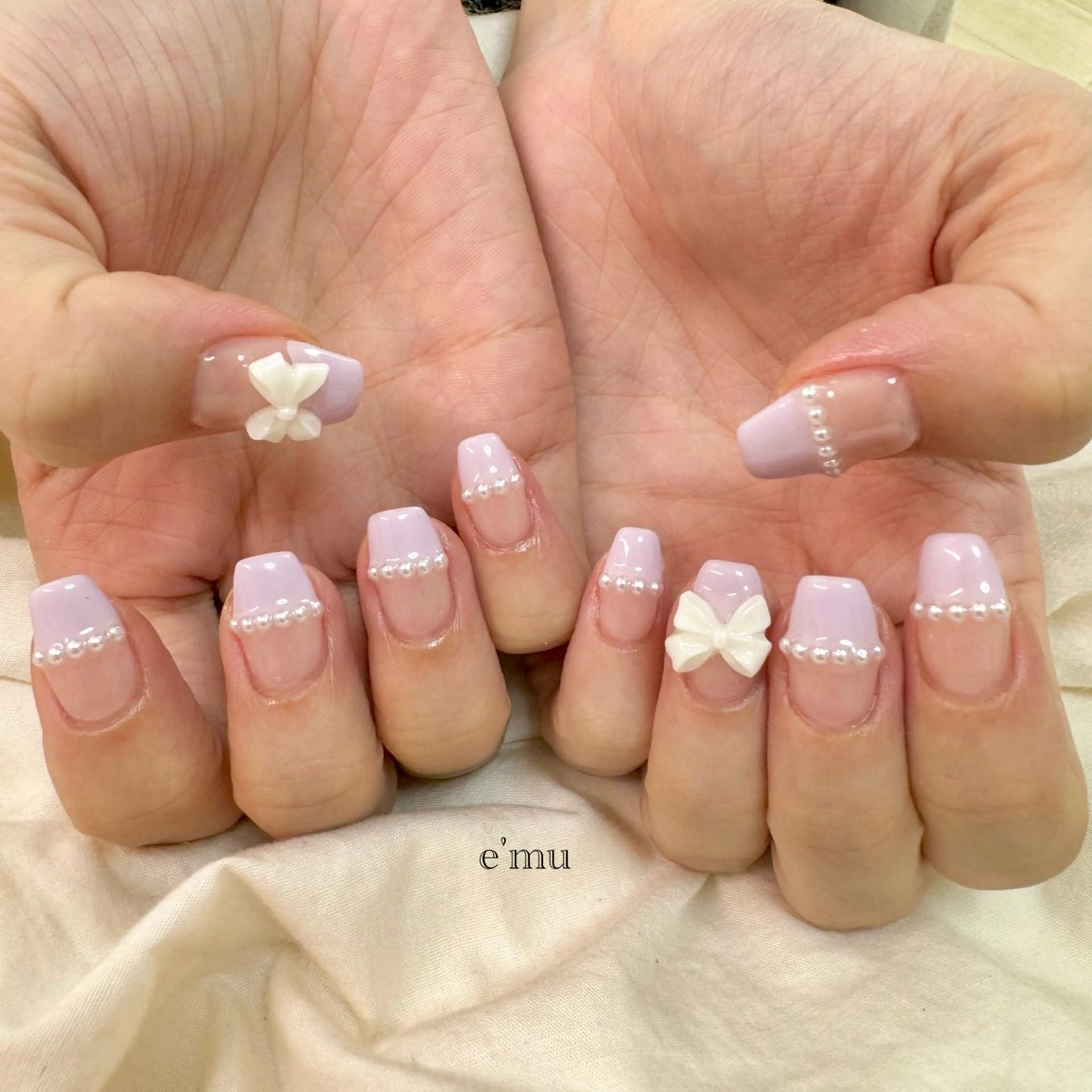 ネイル フレンチネイル リボン nail salon e'mu💐のネイルデザイン
