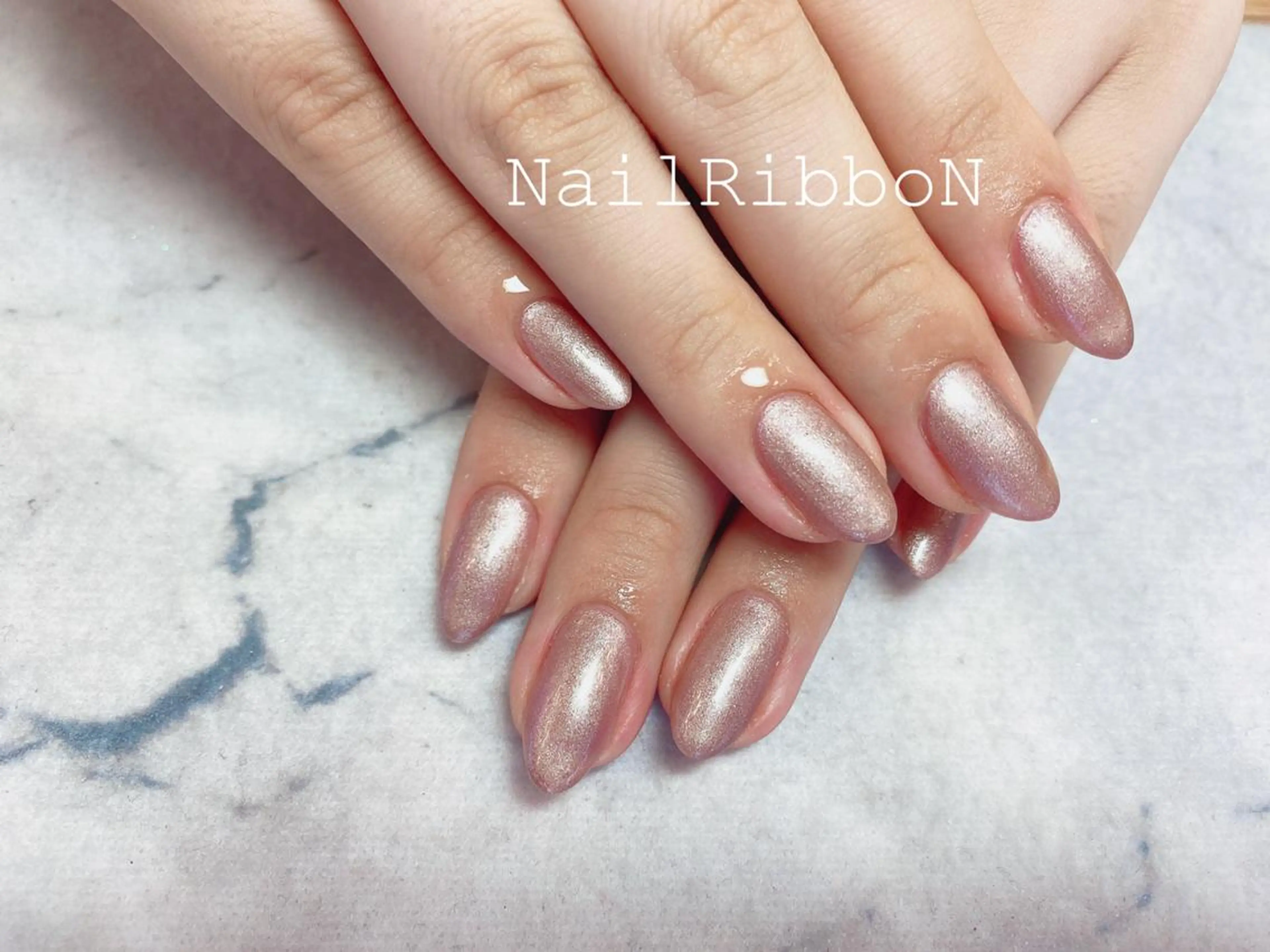 ネイル ネイルリボン 受付スタッフのネイルデザイン