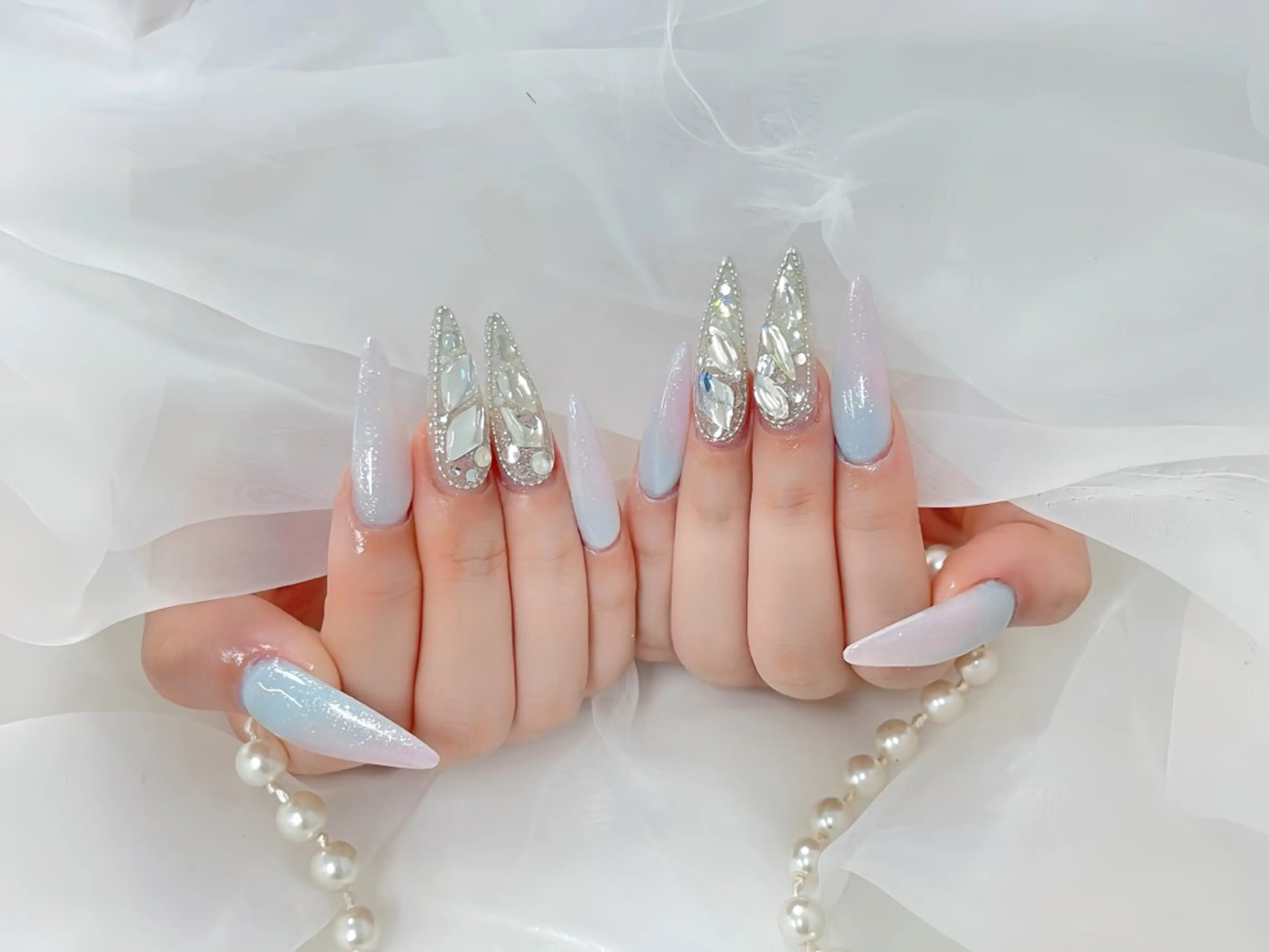ネイル オーロラネイル チークネイル 桜ネイル クリアネイル ドット ハンドネイル Rin Nail Shinokuboのネイルデザイン