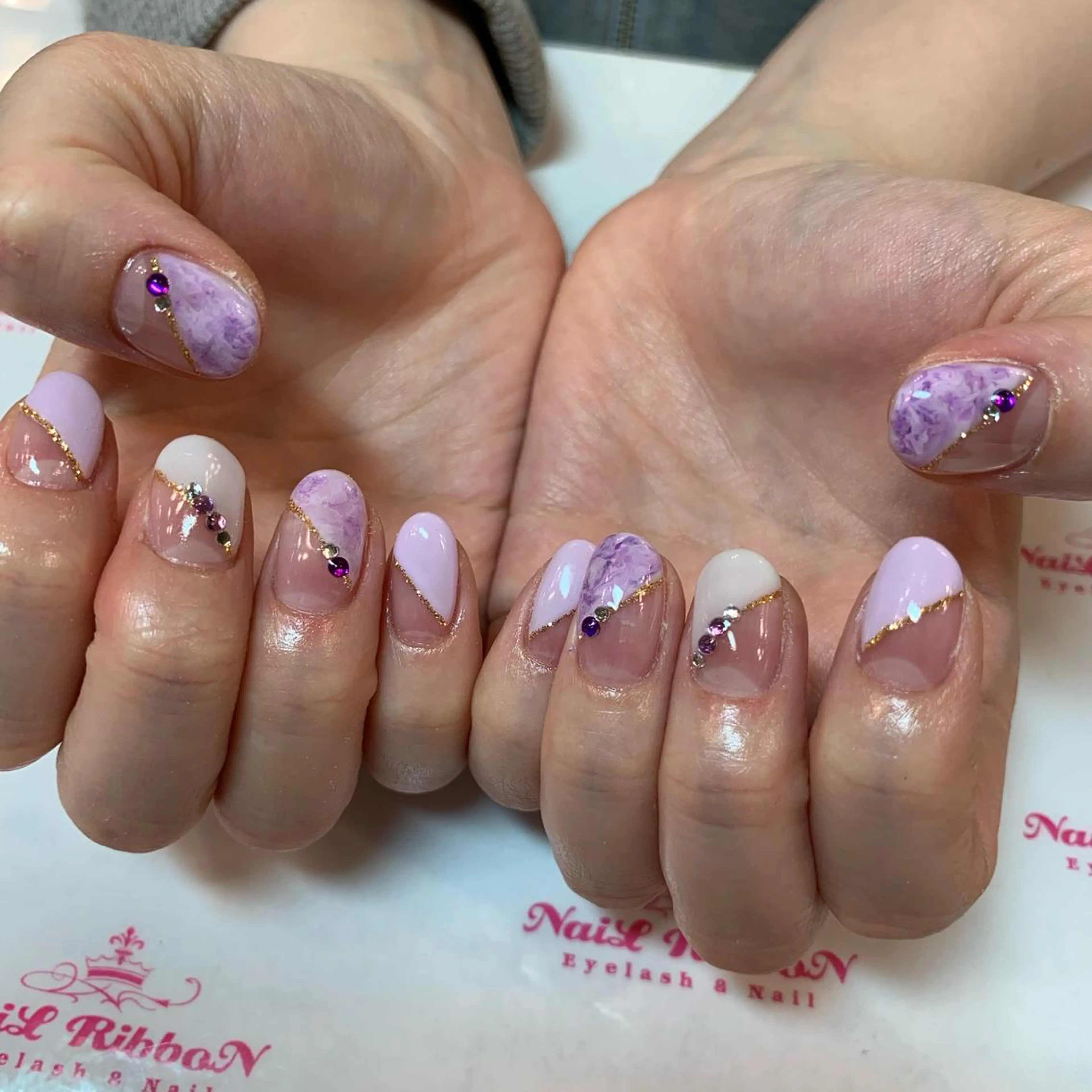 ネイル ネイルリボン 受付スタッフのネイルデザイン