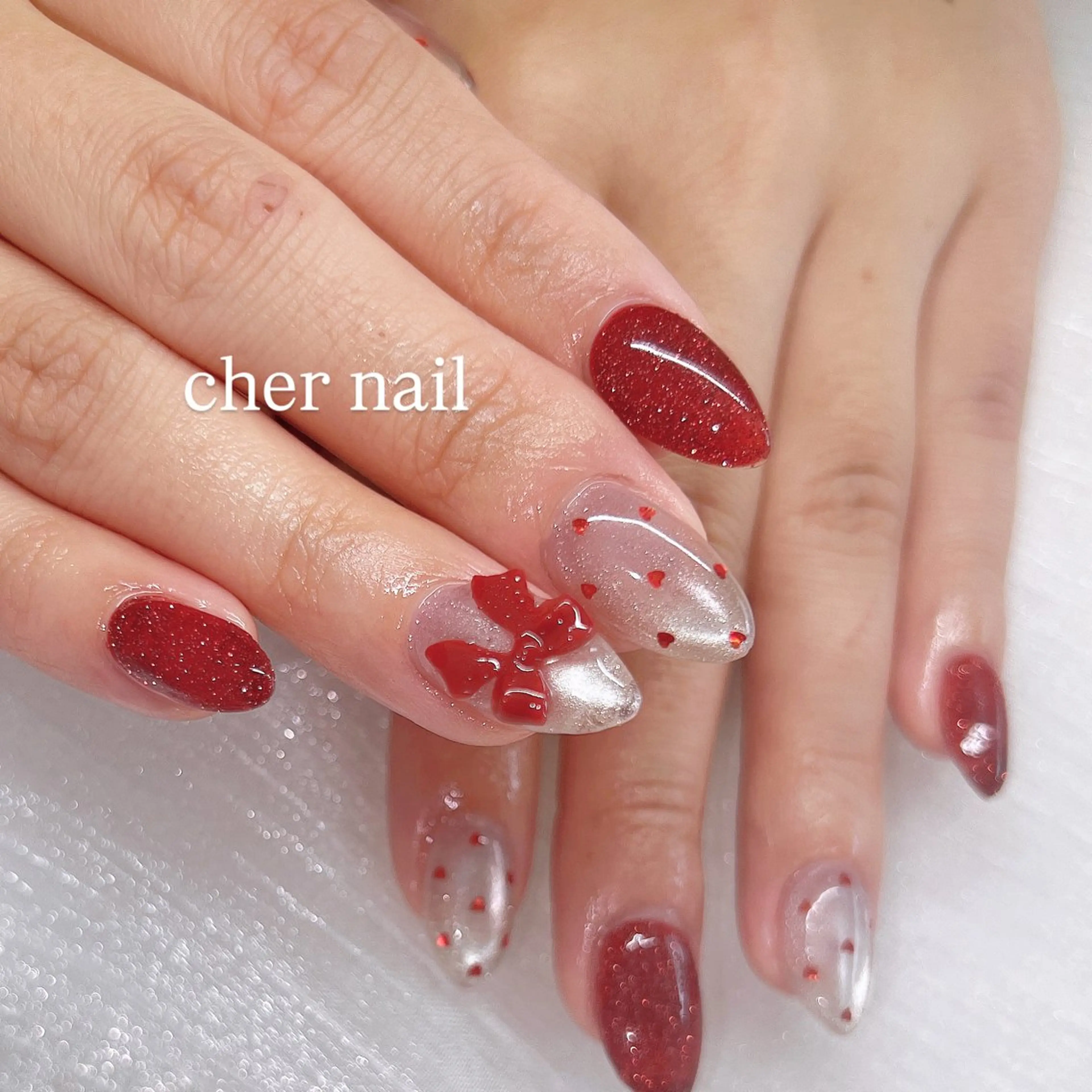 ネイル マグネットネイル リボン 冬ネイル クリスマス CHER NAIL(シェルネイル)所属・cher loydのネイルデザイン