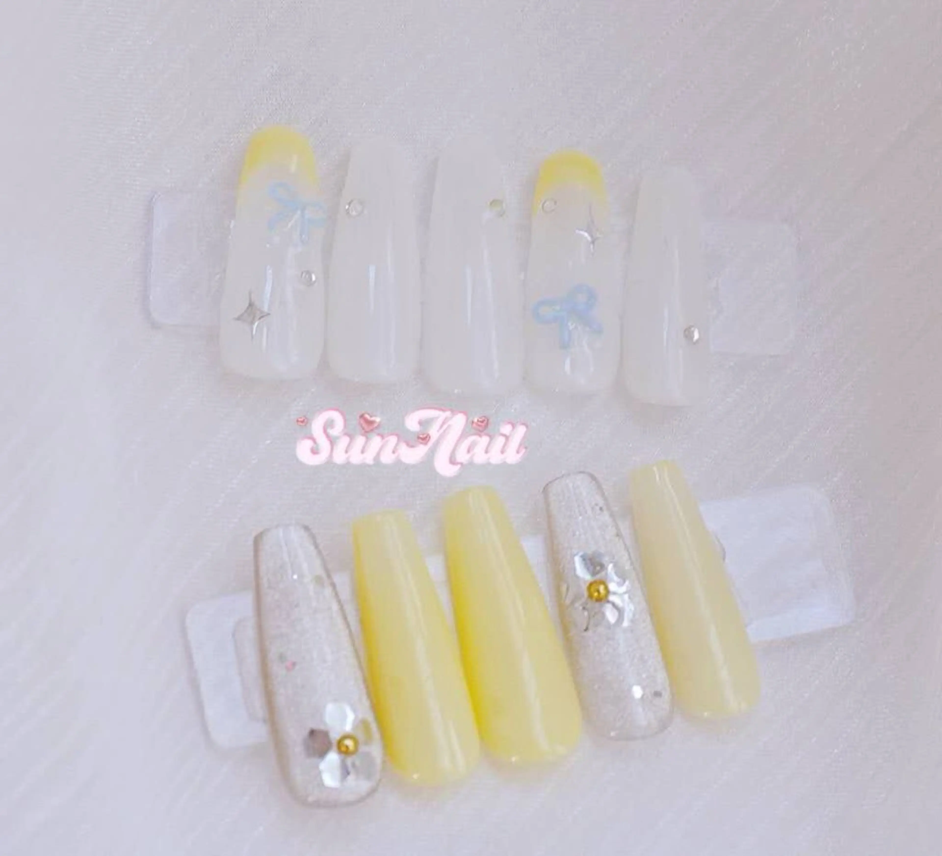 ネイル チークネイル 長さ出し フラワーネイル フレンチネイル ガーリー sun nail池袋 モデル募集のネイルデザイン