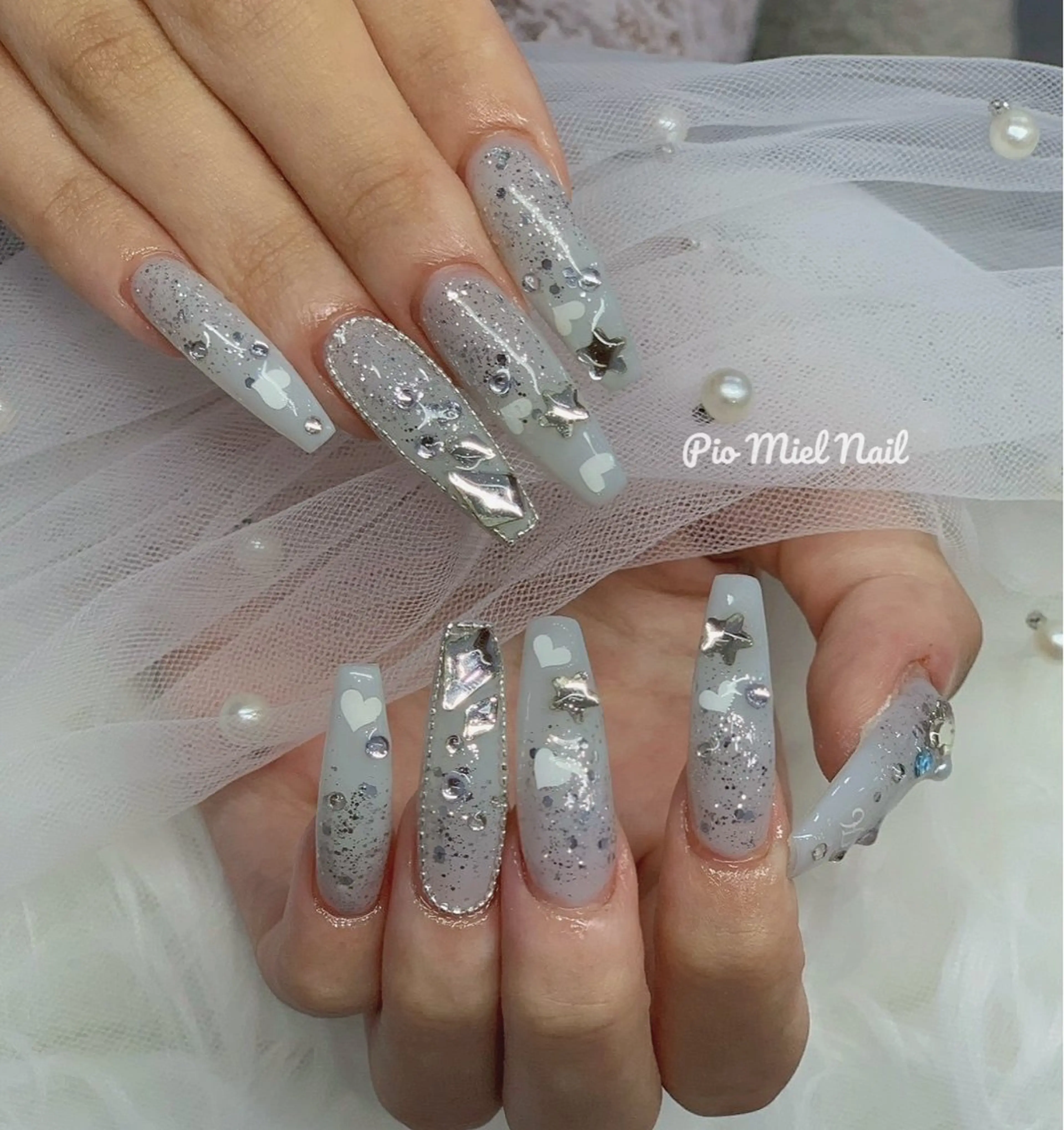 ロング 韓国風ヘア ハンドネイル ハンドケア Pio Mielのネイルデザイン