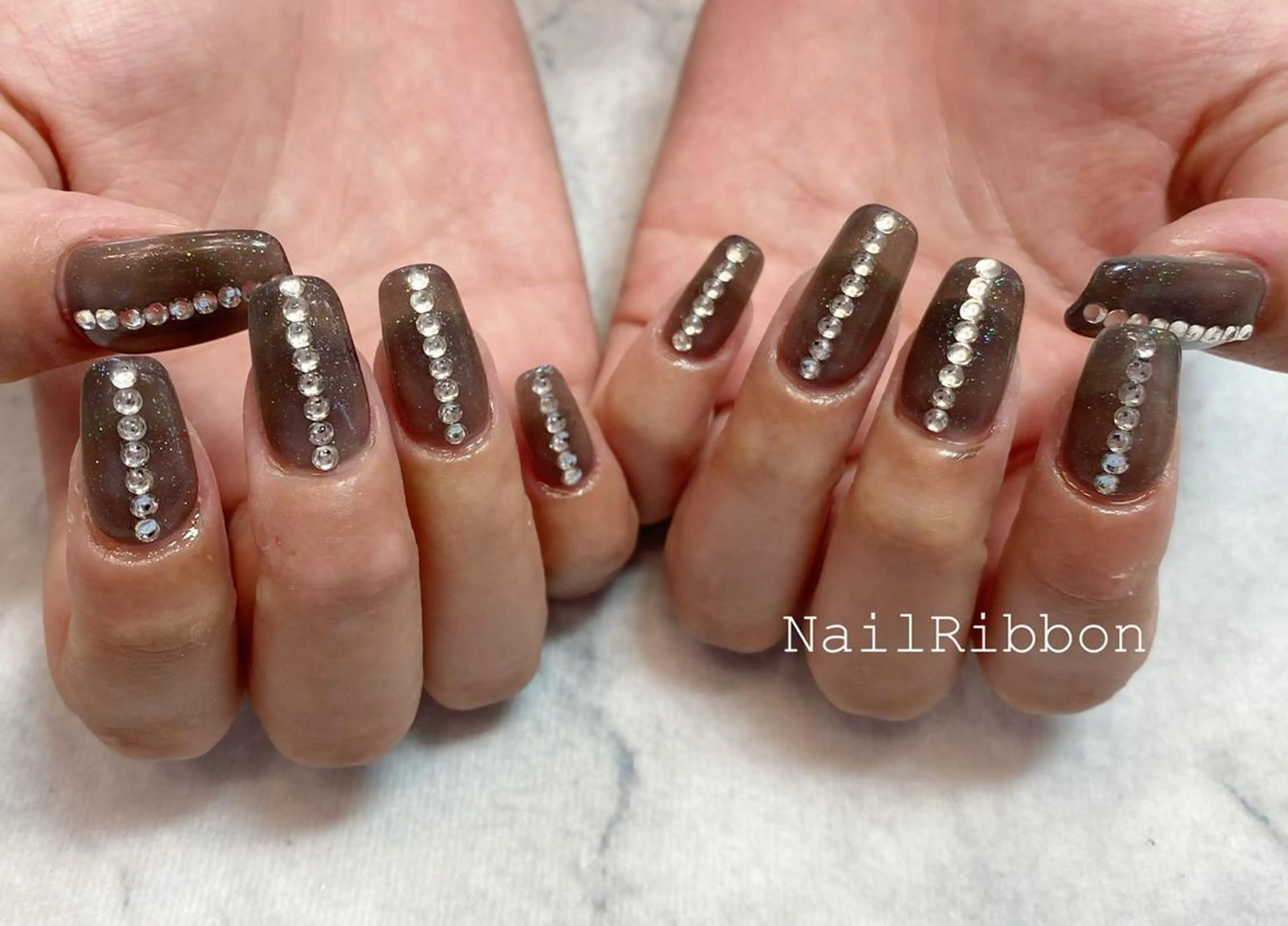 ネイル ネイルリボン 受付スタッフのネイルデザイン