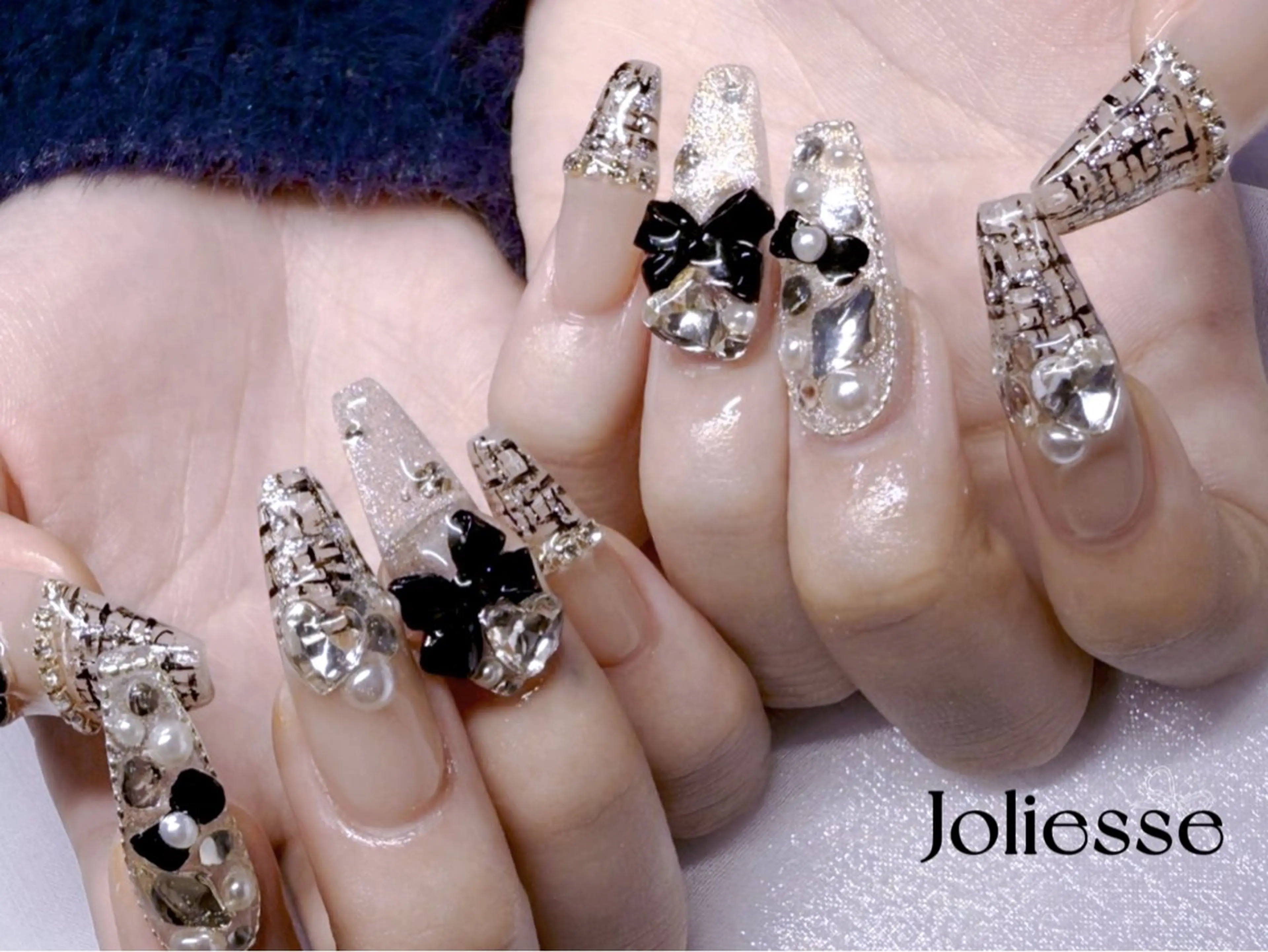 ネイル リボン ツイードネイル Joliesse nail salonのネイルデザイン
