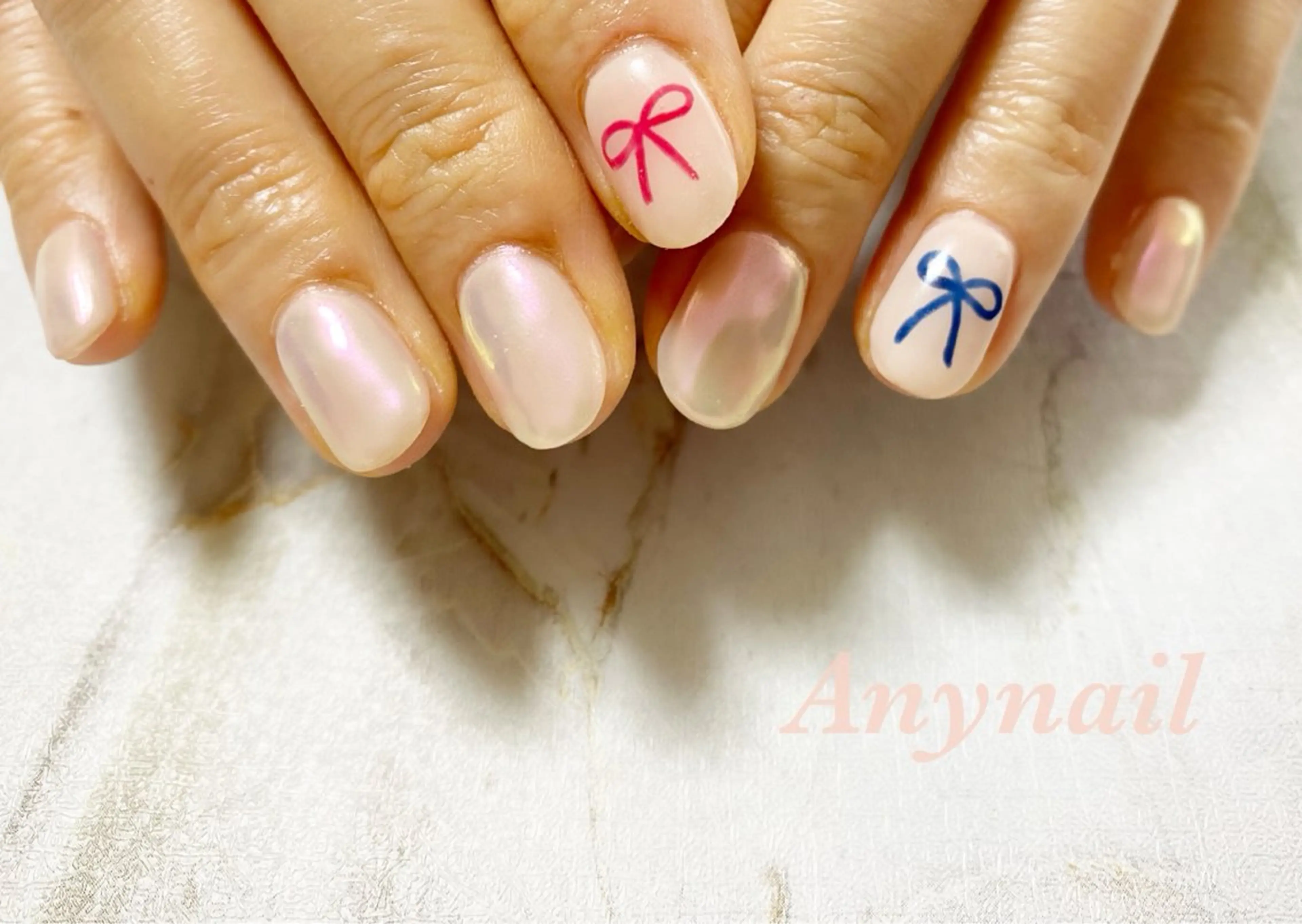 ネイル オーロラネイル ブルー オフィスネイル リボン 岩澤 恵子のネイルデザイン