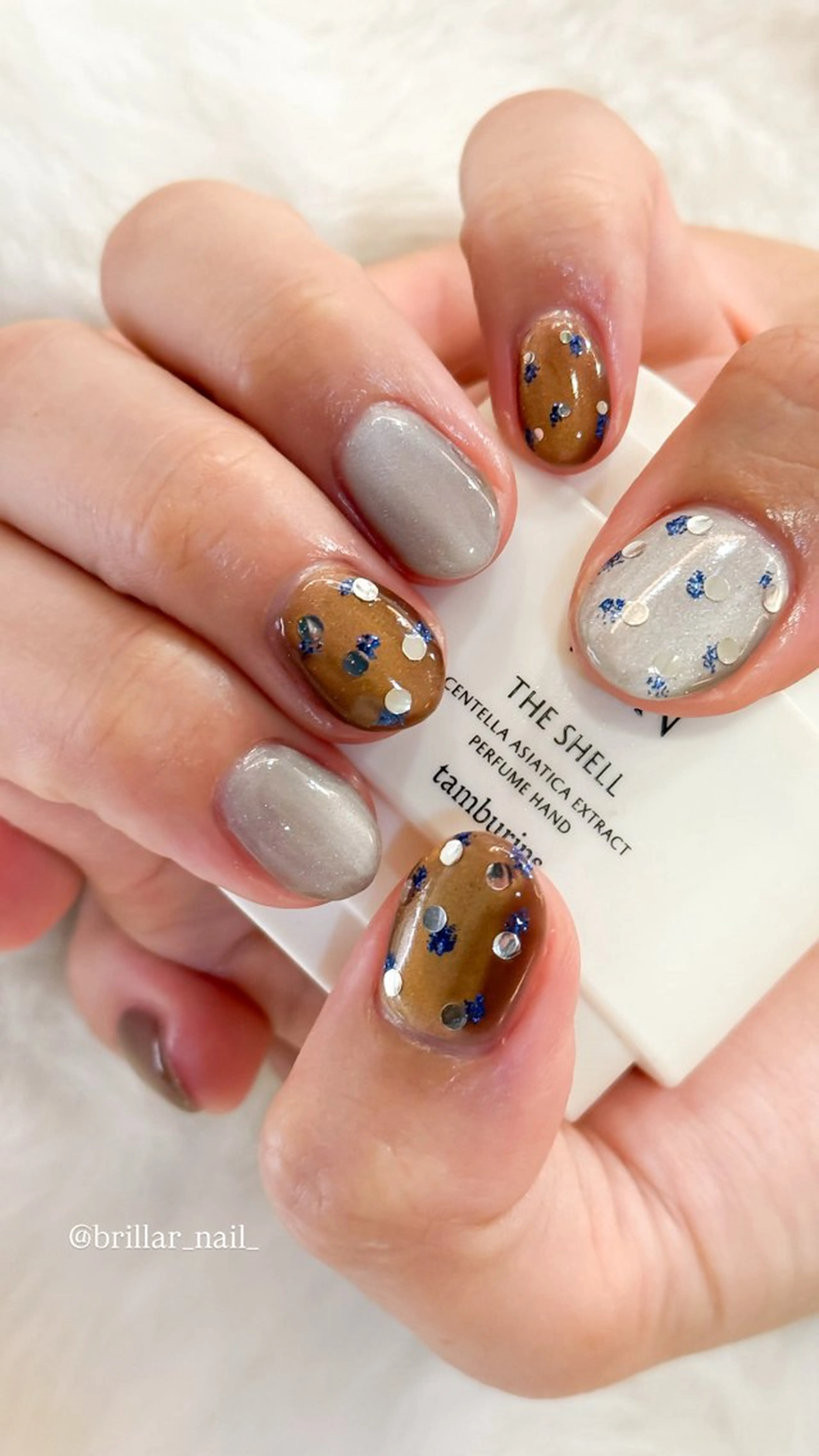 ハンド【デザインネイル🤎🩶】オフ含の写真