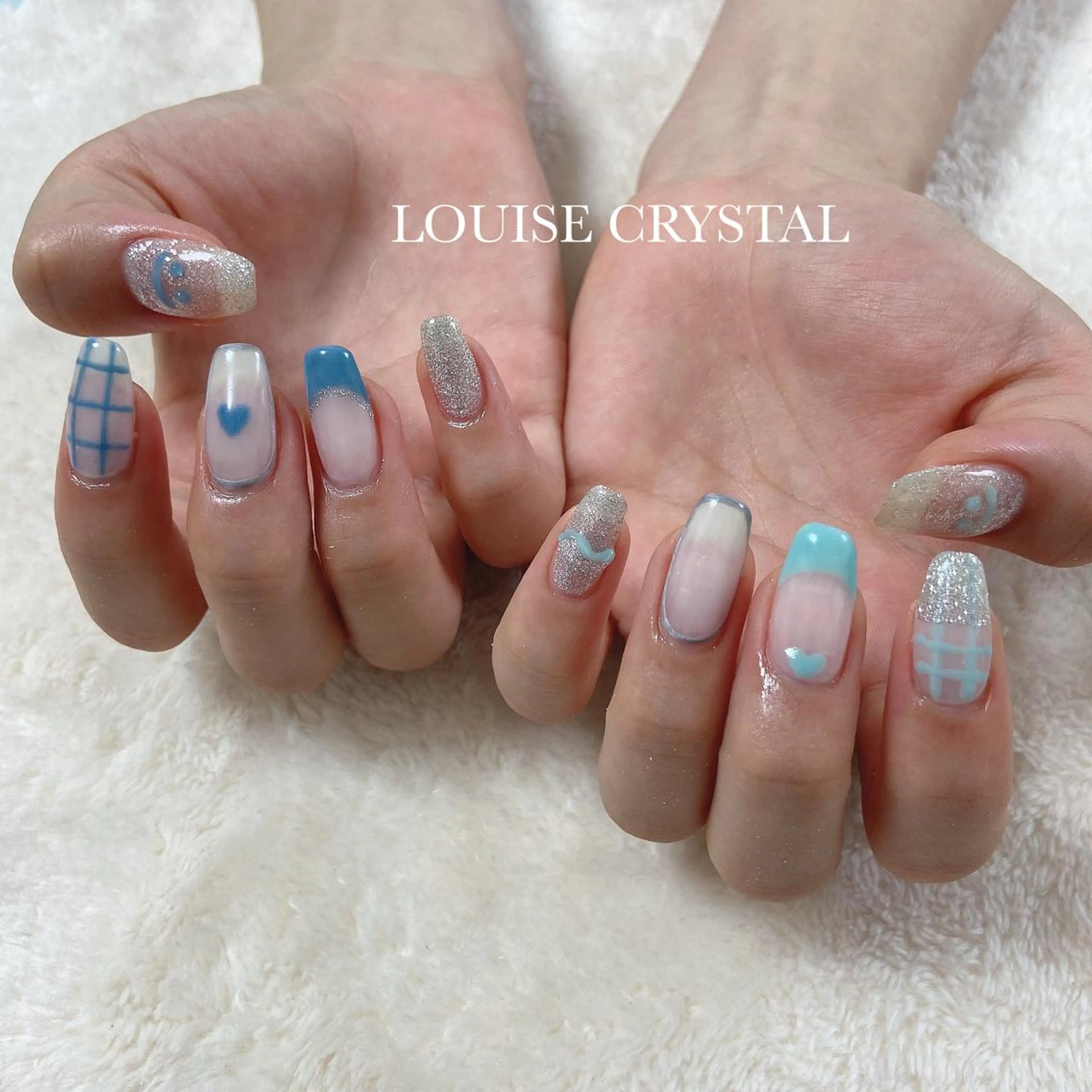 ネイル ハンドネイル LOUISE CRYSTALのネイルデザイン