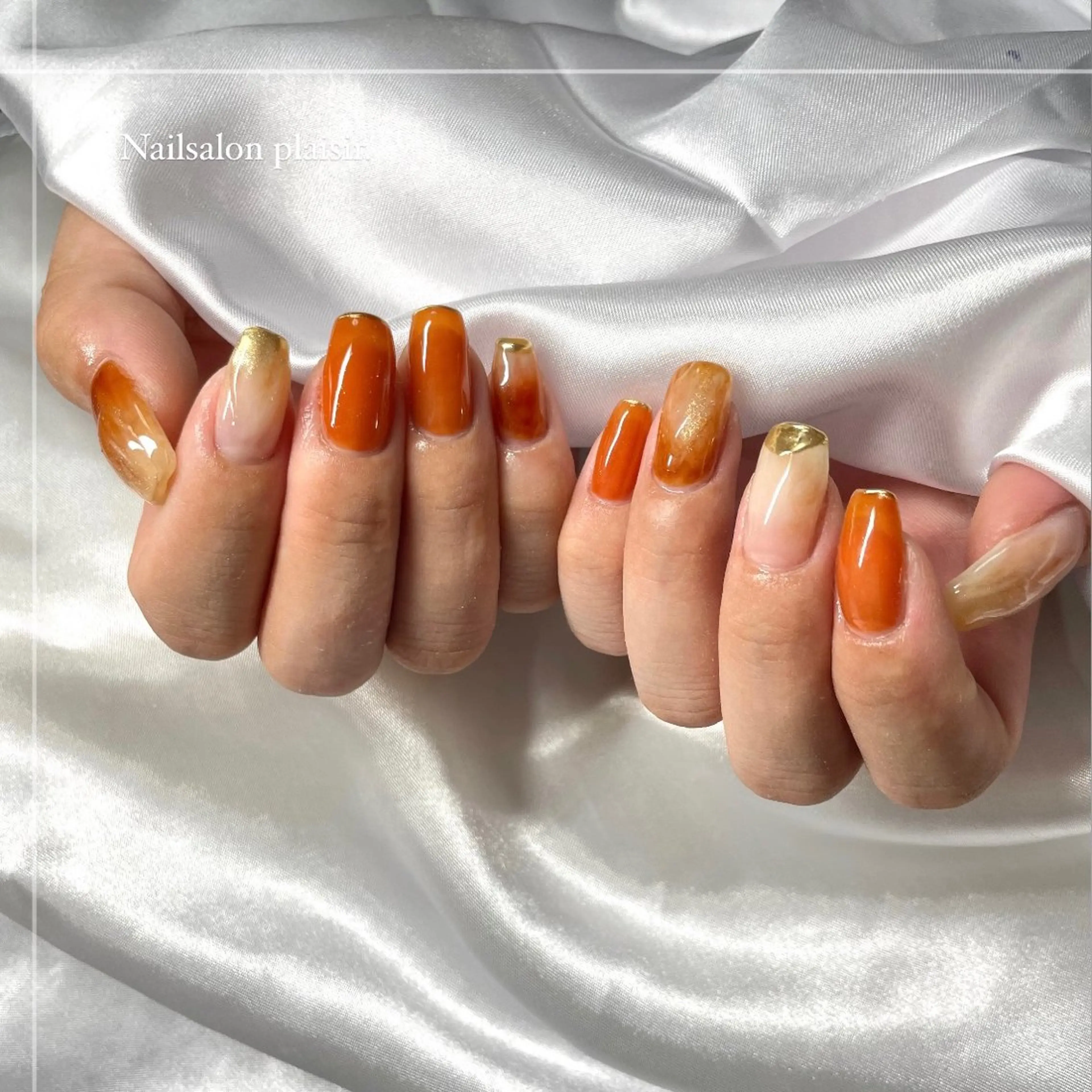 ネイル オレンジ ワンホンネイル ハンドネイル Nallsalon Plaisirbeauty所属・Plaisir beautyのネイルデザイン