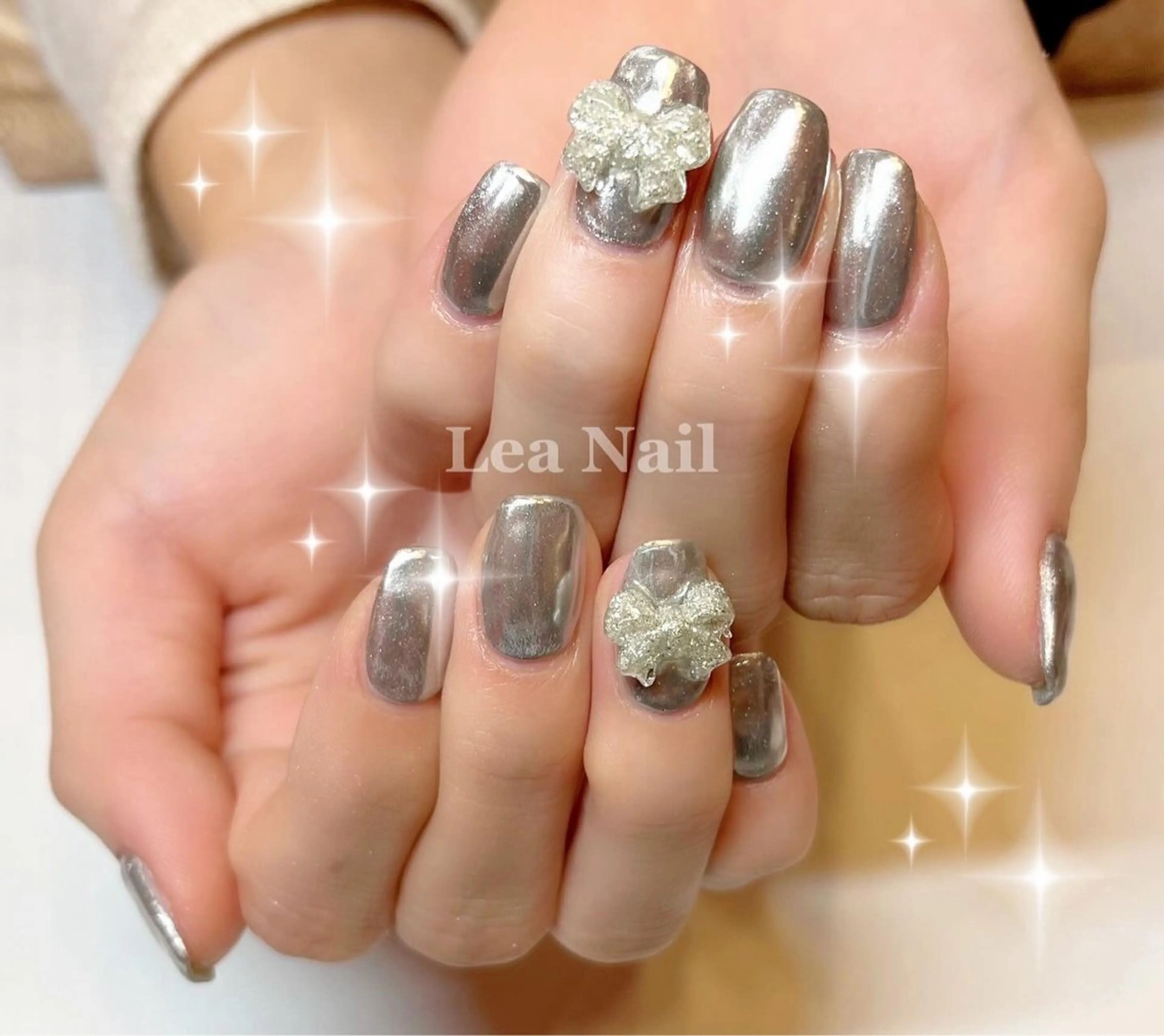 ネイル ミラーネイル リボン Lea Nailのネイルデザイン