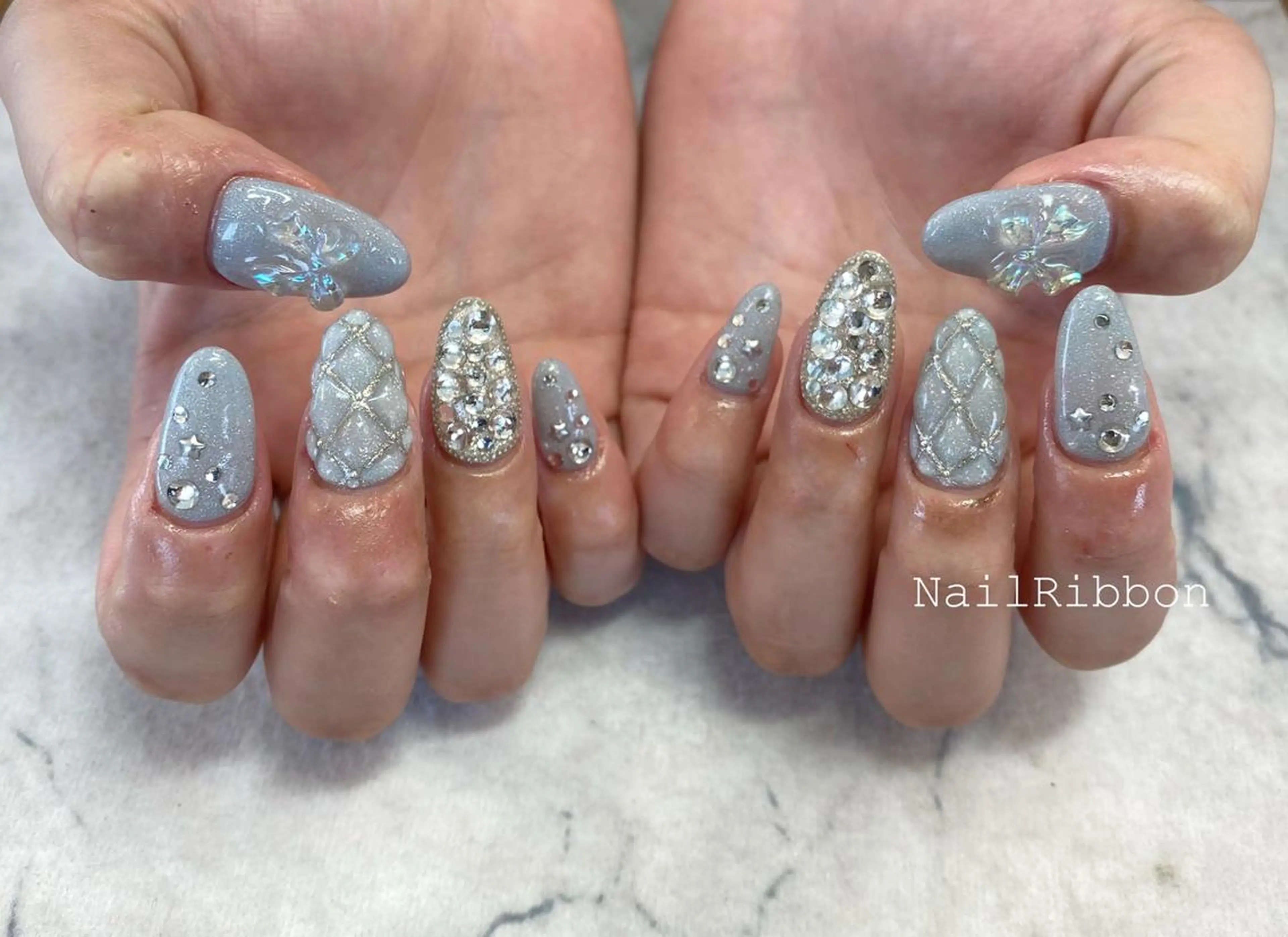 ネイル ネイルリボン 受付スタッフのネイルデザイン