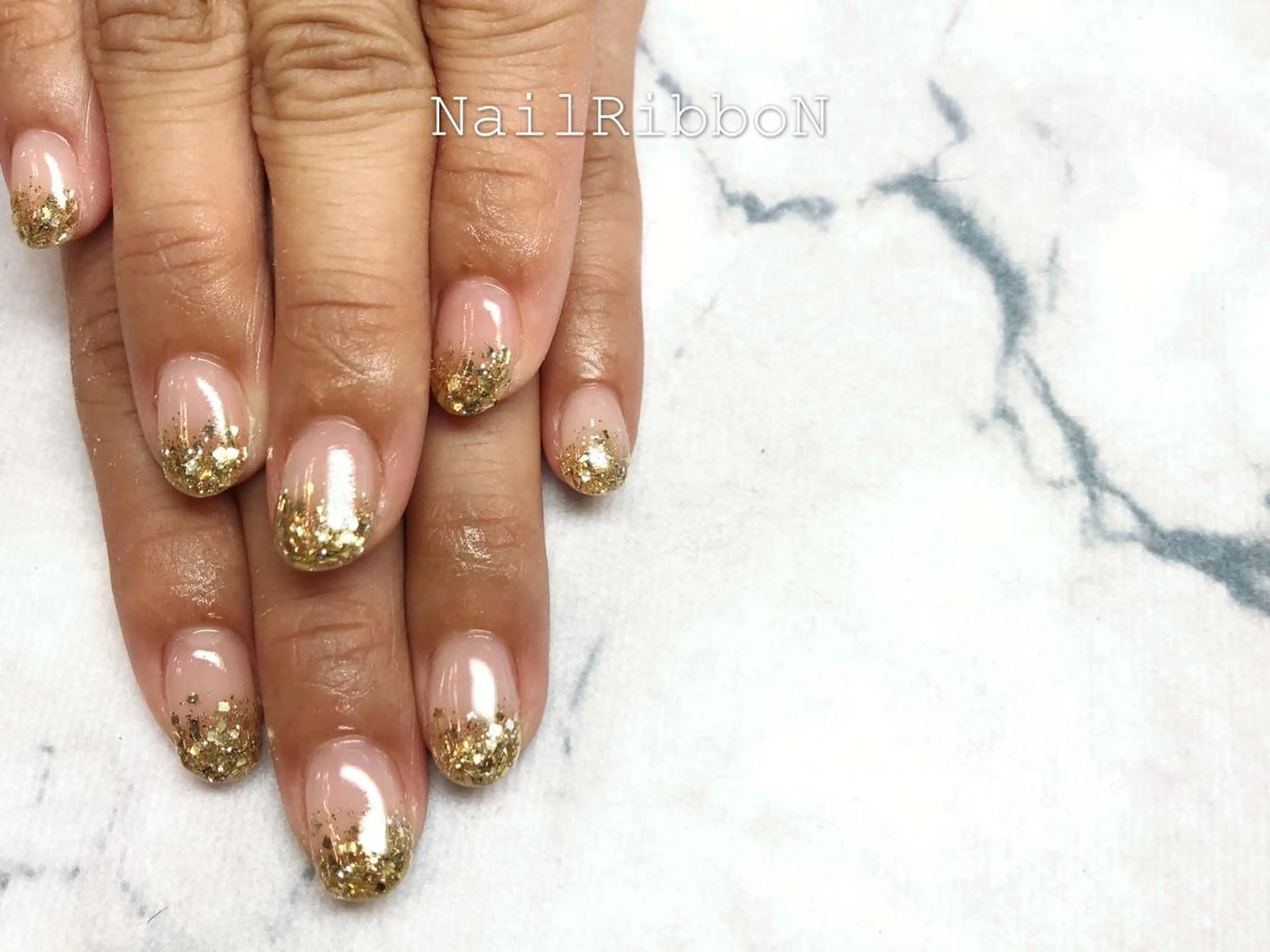 ネイル ネイルリボン 受付スタッフのネイルデザイン