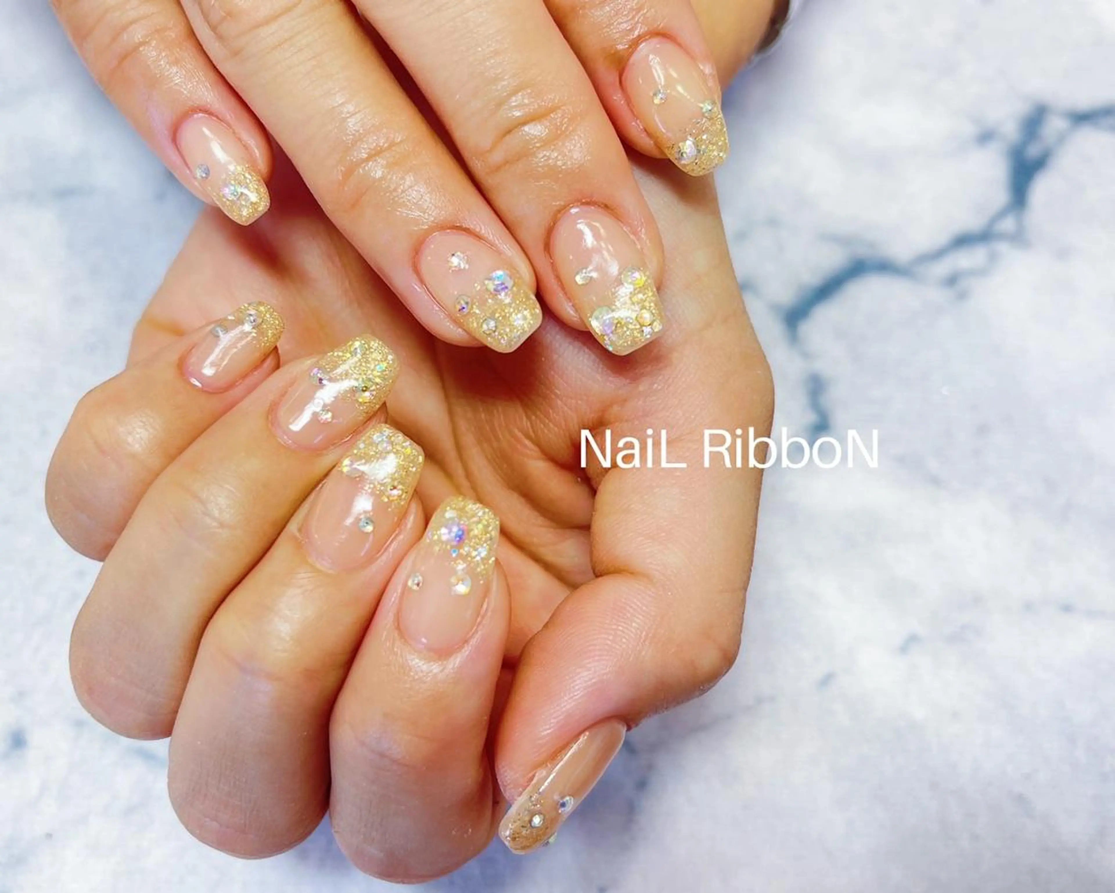 ネイル ネイルリボン 受付スタッフのネイルデザイン