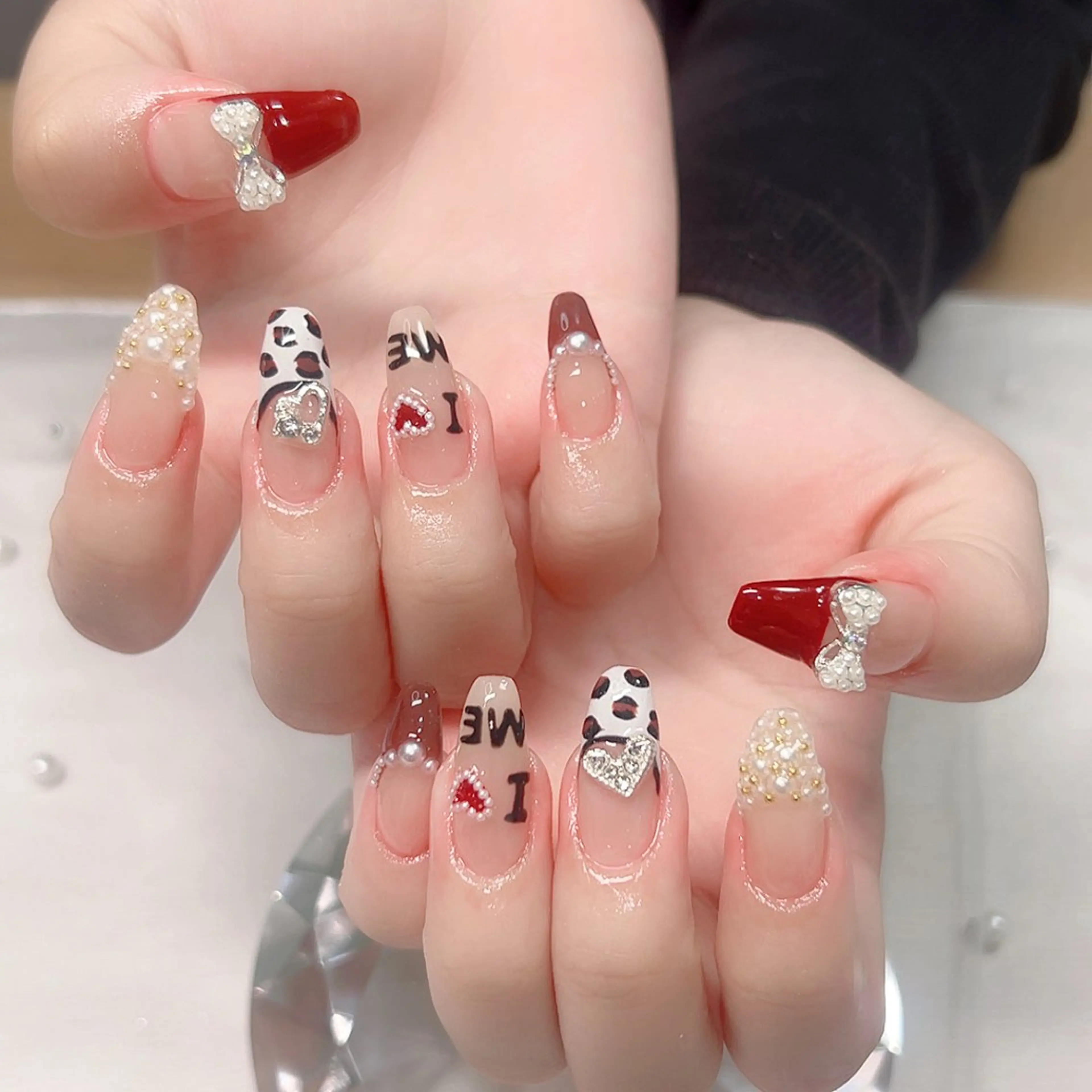 ネイル アニマル柄 フレンチネイル リボン Cute Tips nailのネイルデザイン