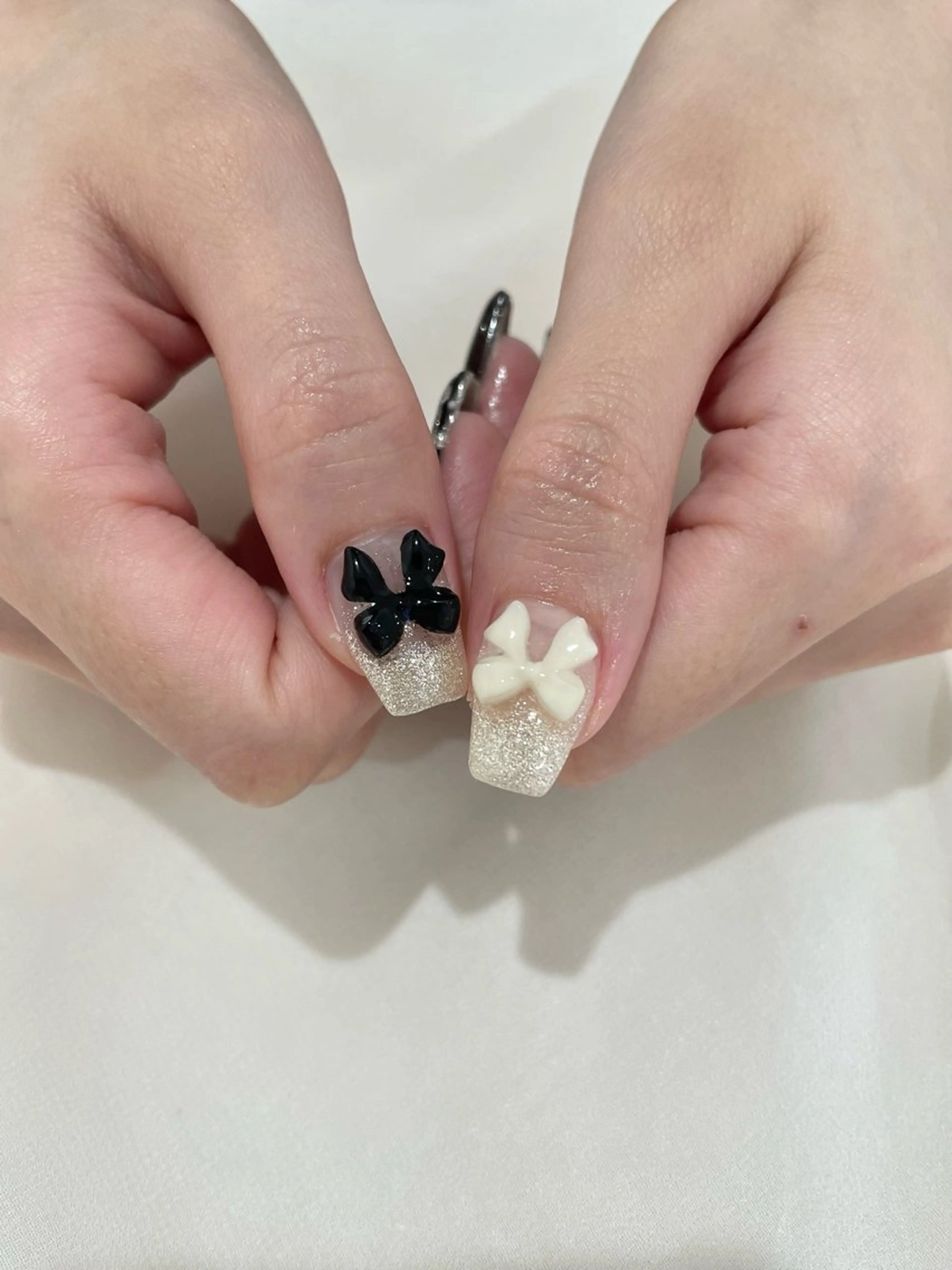 ネイル リボン ハンドネイル soirée所属・nail salon Soiréeのネイルデザイン