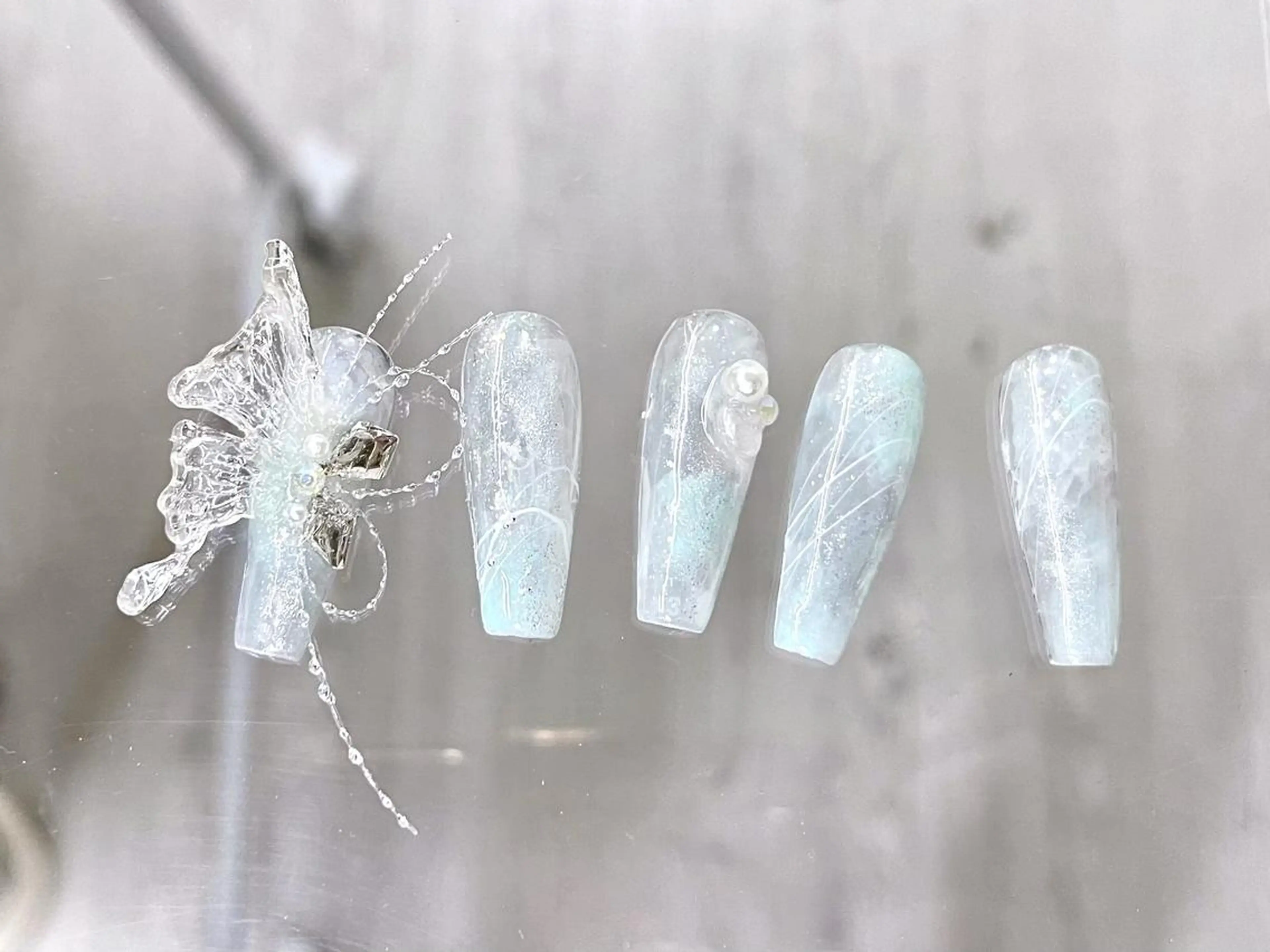 ネイル 🦋y y Nail 🤍のネイルデザイン