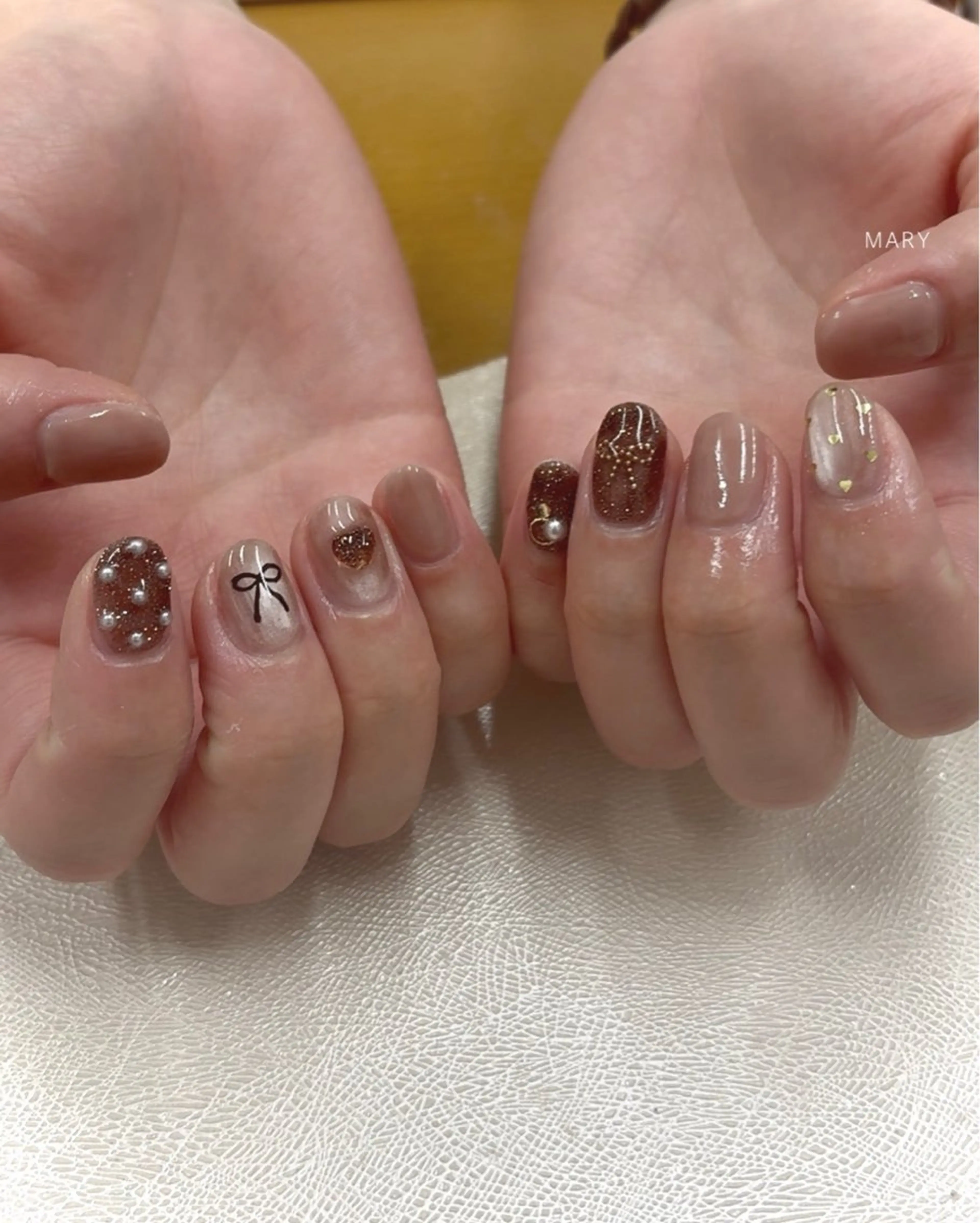ネイル ブラウン ハート マグネットネイル リボン ハンドネイル Mary nail .narumiのネイルデザイン